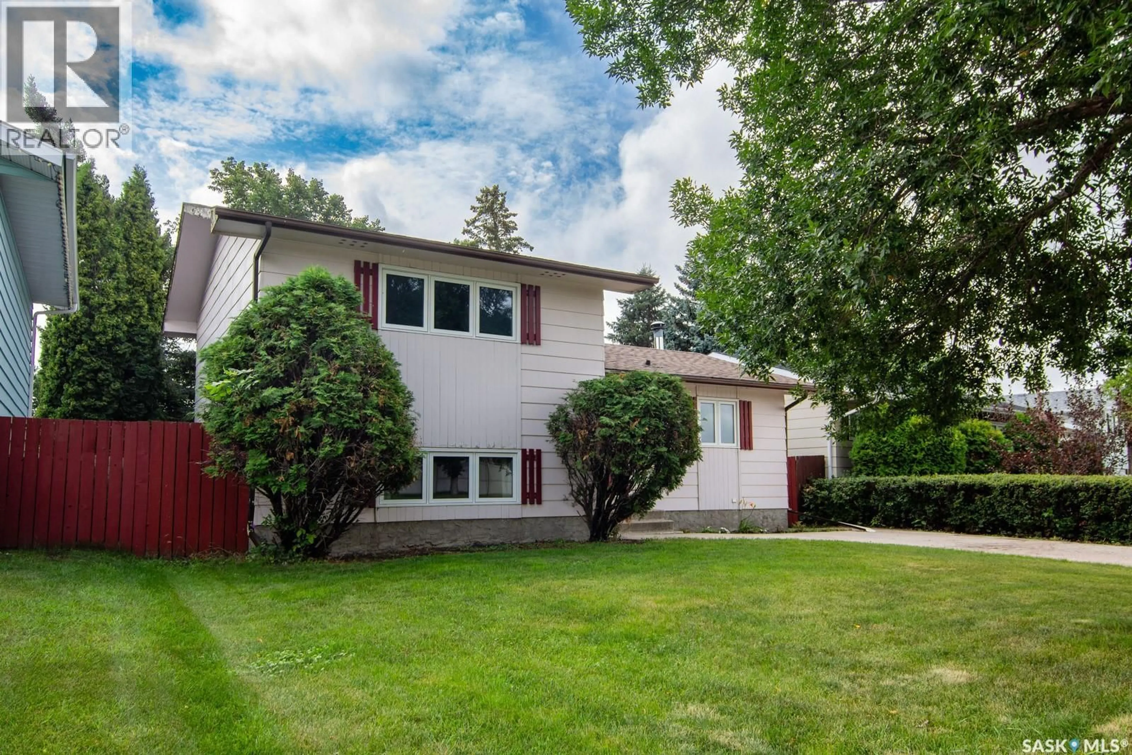 Home with vinyl exterior material, street for 235 MCCORMACK ROAD, Saskatoon Saskatchewan S7M4V1