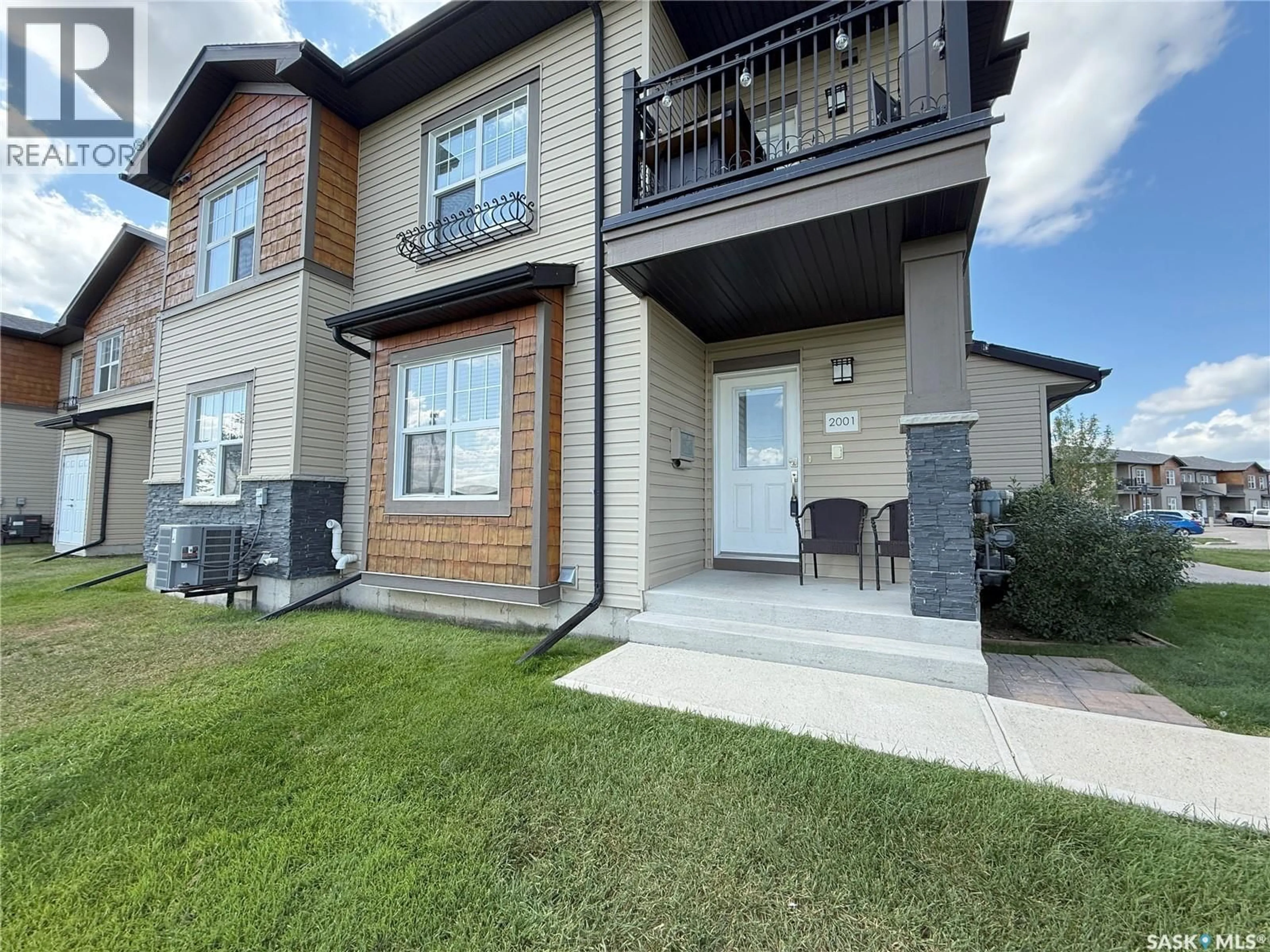 A pic from outside/outdoor area/front of a property/back of a property/a pic from drone, unknown for 1015 - 2001 PATRICK CRESCENT, Saskatoon Saskatchewan S7W0M1