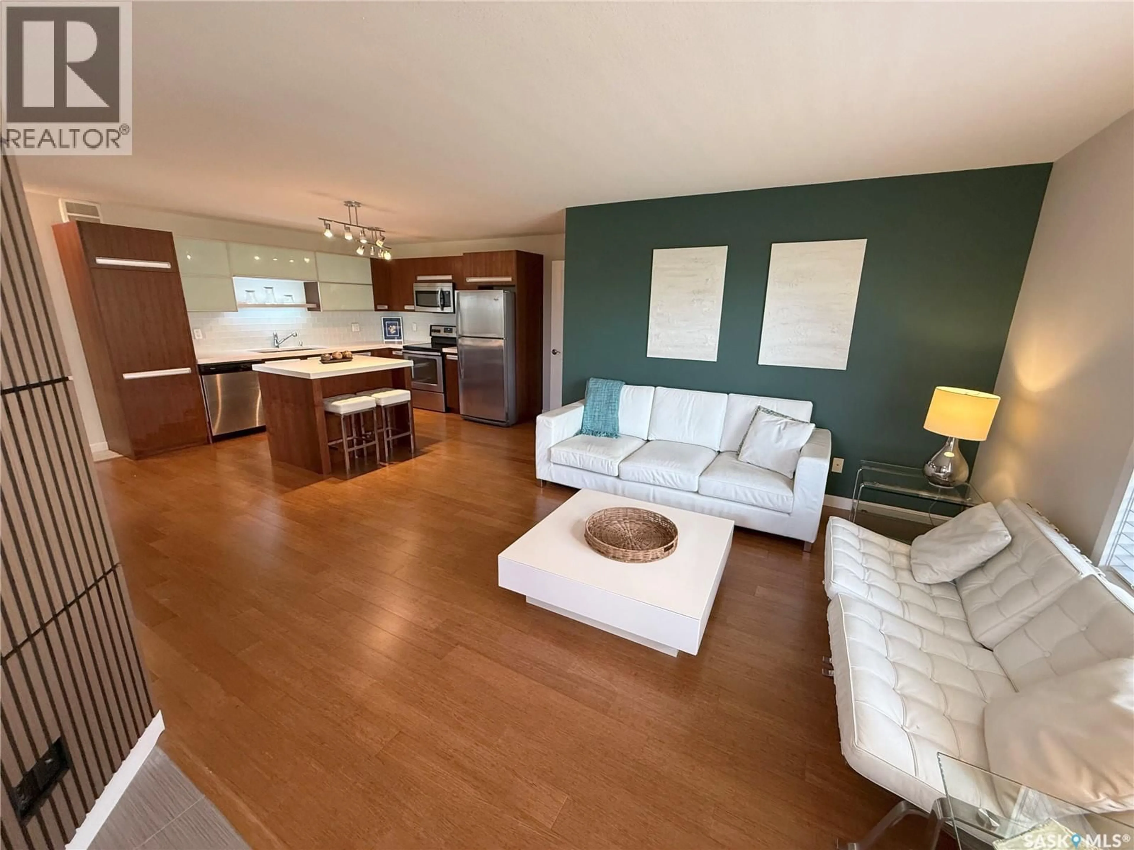 Living room with furniture, wood/laminate floor for 1015 - 2001 PATRICK CRESCENT, Saskatoon Saskatchewan S7W0M1