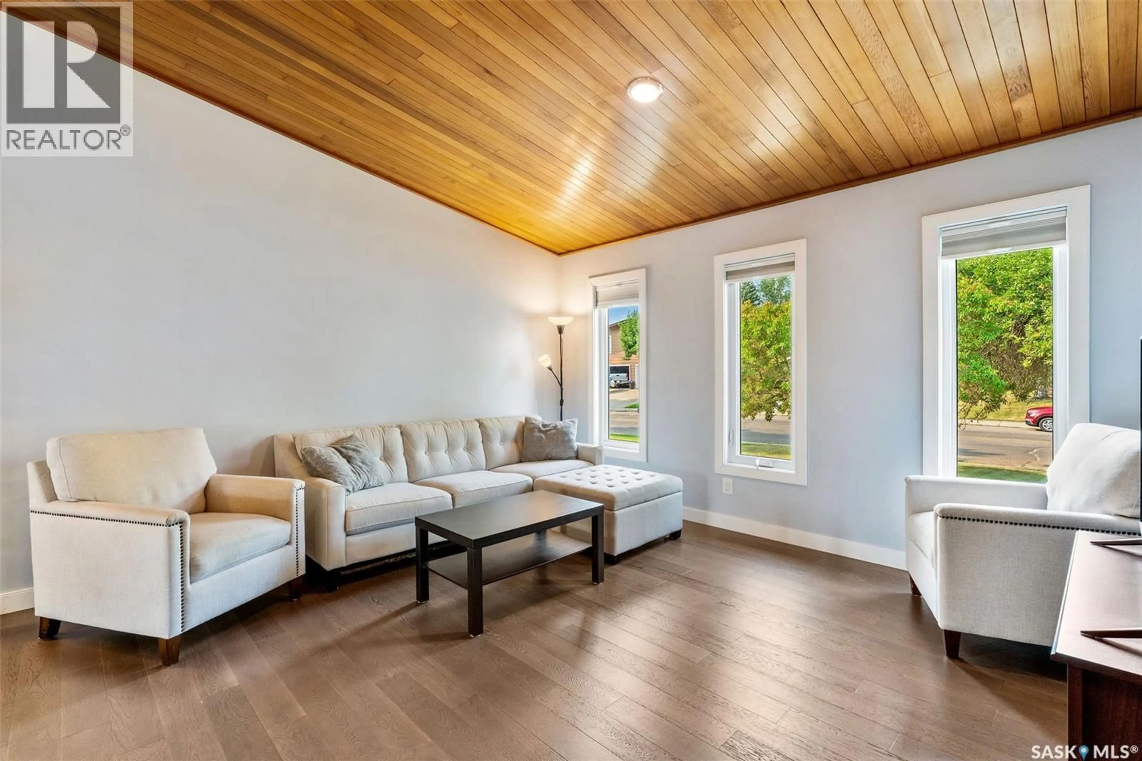 Living room with furniture, wood/laminate floor for 3060 SHERMAN DRIVE, Prince Albert Saskatchewan S6V7H6