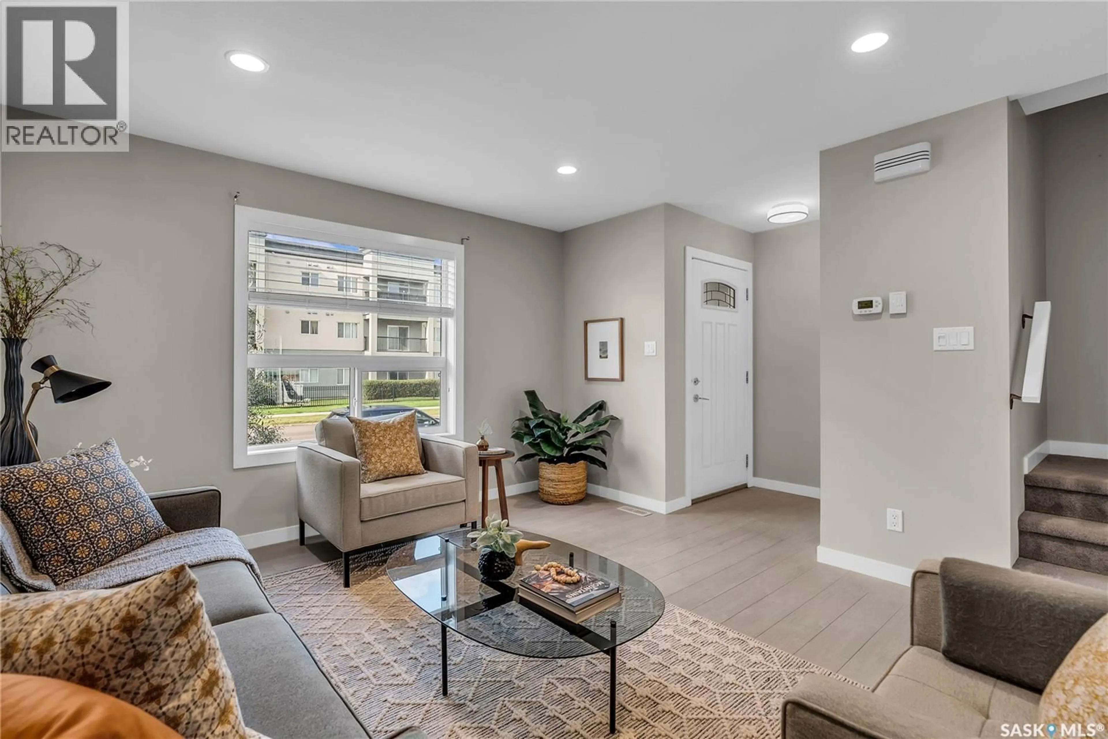 Living room with furniture, unknown for 3127 MCCLOCKLIN ROAD, Saskatoon Saskatchewan S7R0J1