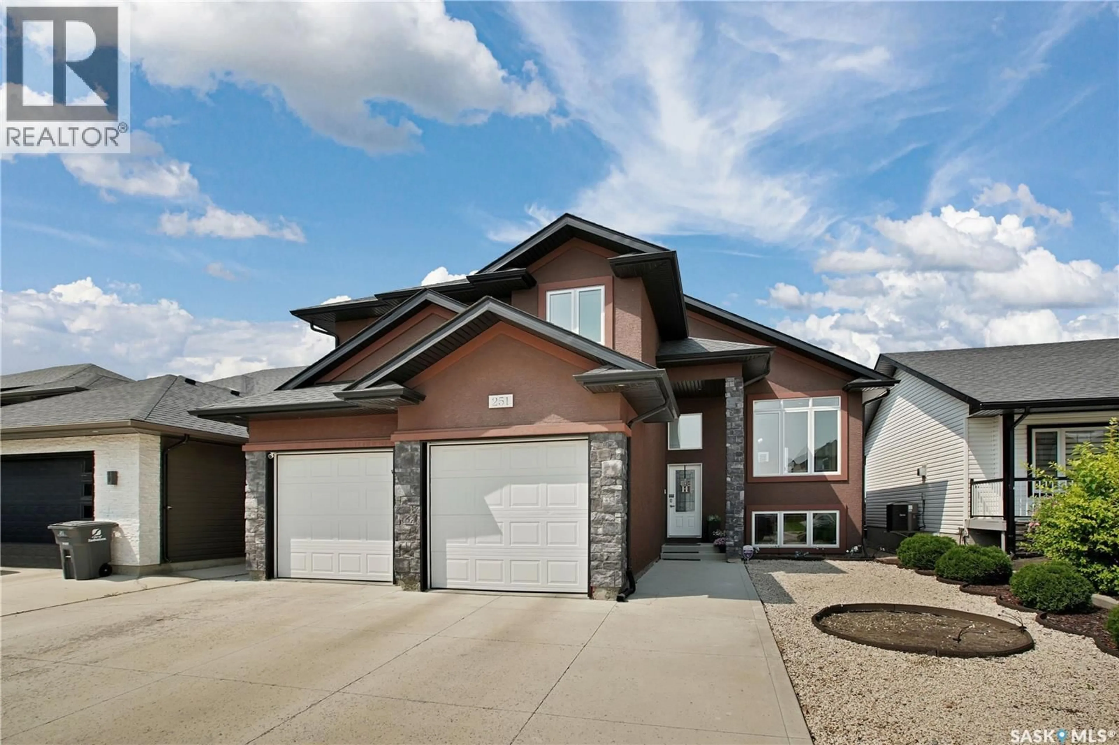 Home with brick exterior material, street for 251 MCCALLUM WAY, Saskatoon Saskatchewan S7R0H7