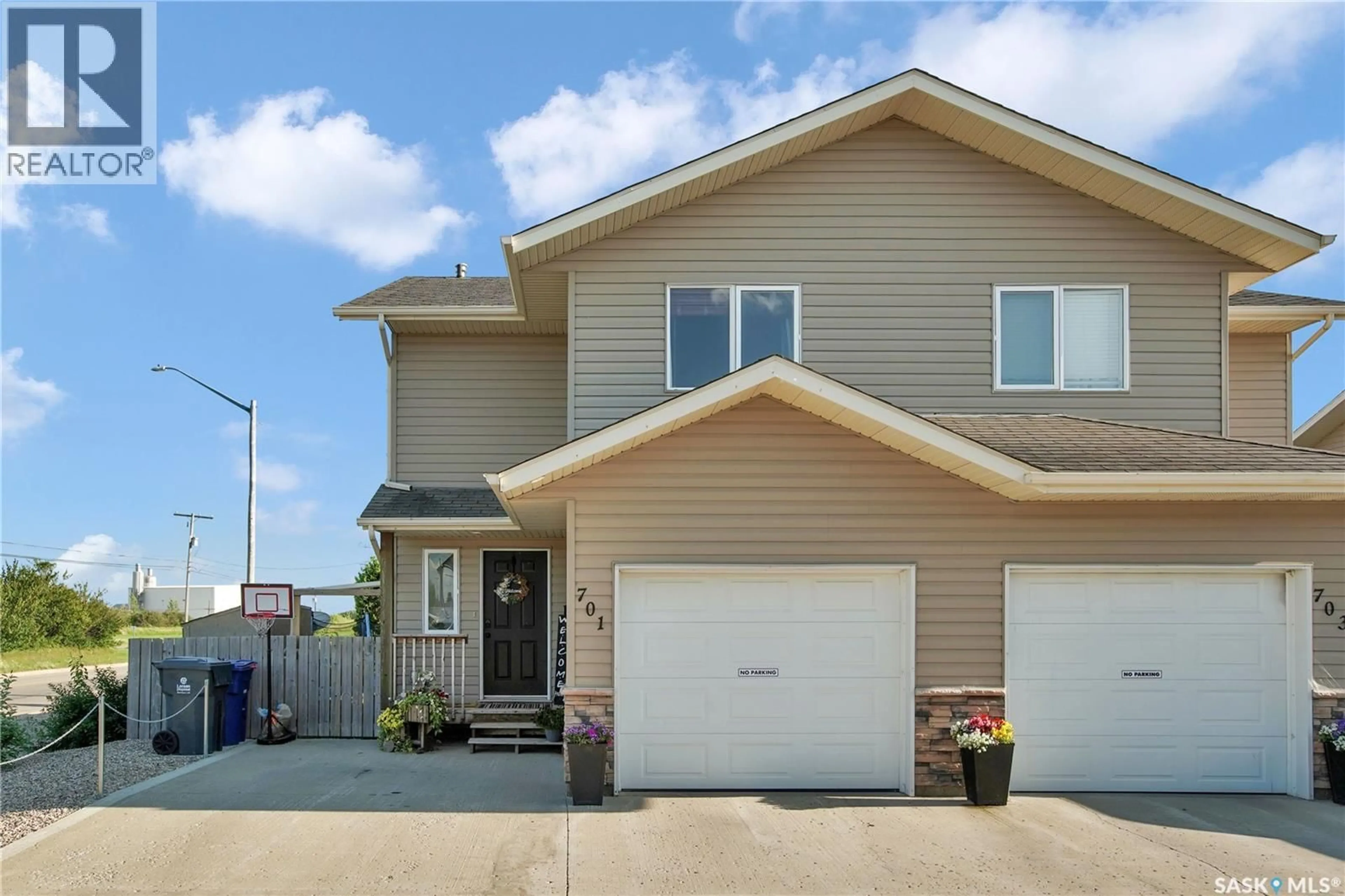 Home with vinyl exterior material, street for S - 701 6TH AVENUE, Warman Saskatchewan S0K4S0