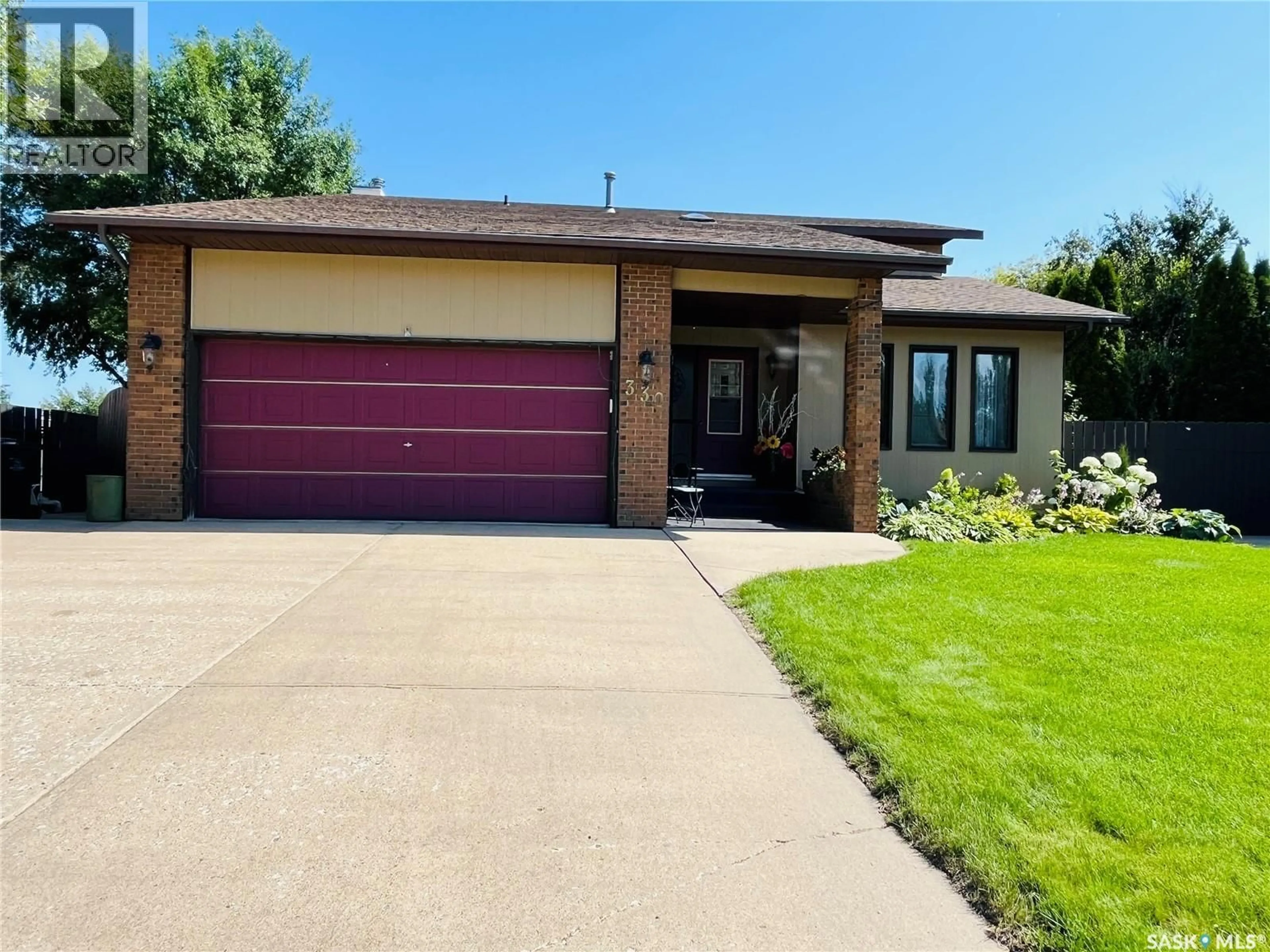 Home with brick exterior material, street for 330 COWIE CRESCENT, Swift Current Saskatchewan S9H4V3