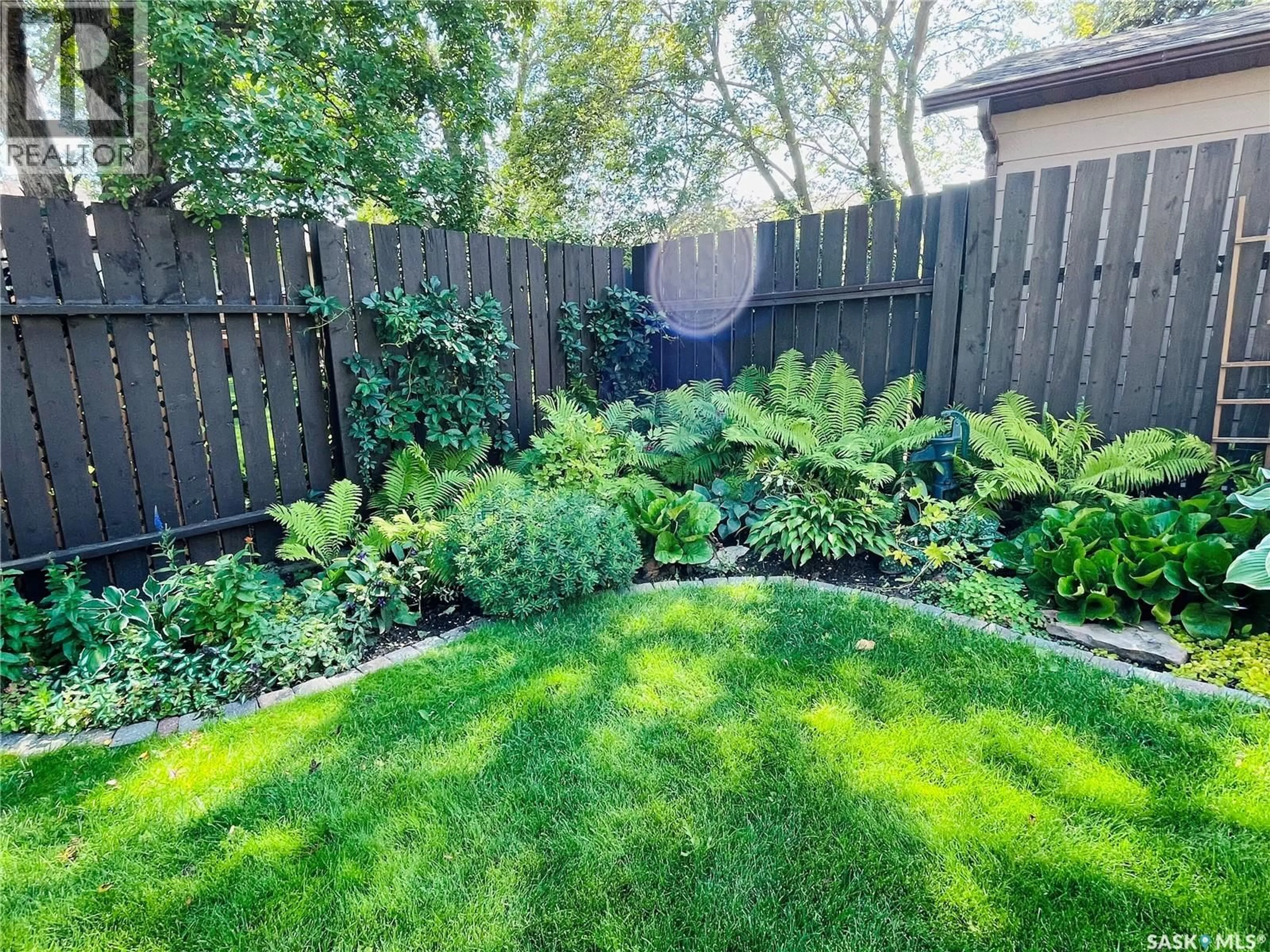A pic from outside/outdoor area/front of a property/back of a property/a pic from drone, forest/trees view for 330 COWIE CRESCENT, Swift Current Saskatchewan S9H4V3