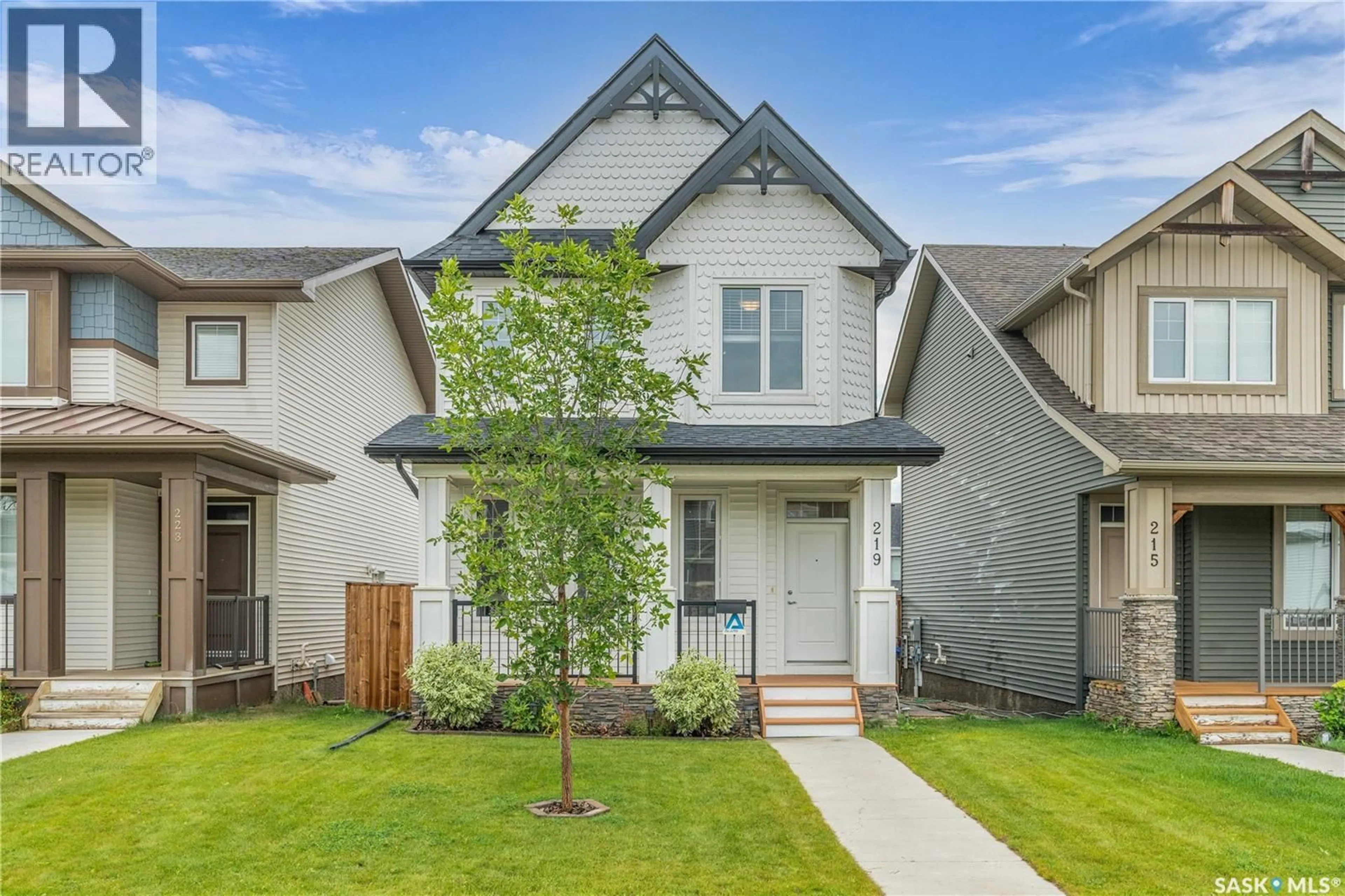 Home with vinyl exterior material, street for 219 NEWTON LINK, Saskatoon Saskatchewan S7V0N6