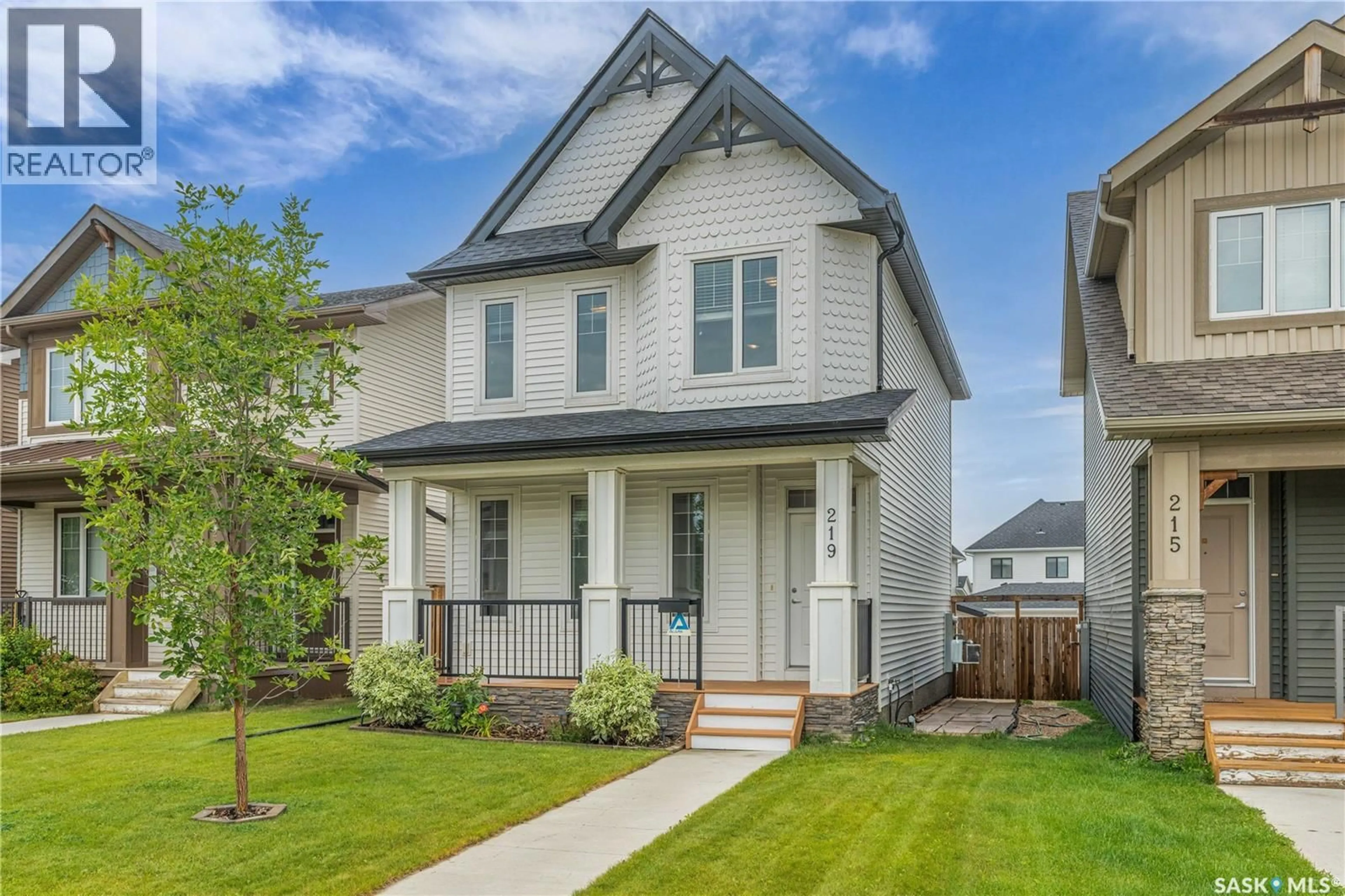 Home with vinyl exterior material, street for 219 NEWTON LINK, Saskatoon Saskatchewan S7V0N6