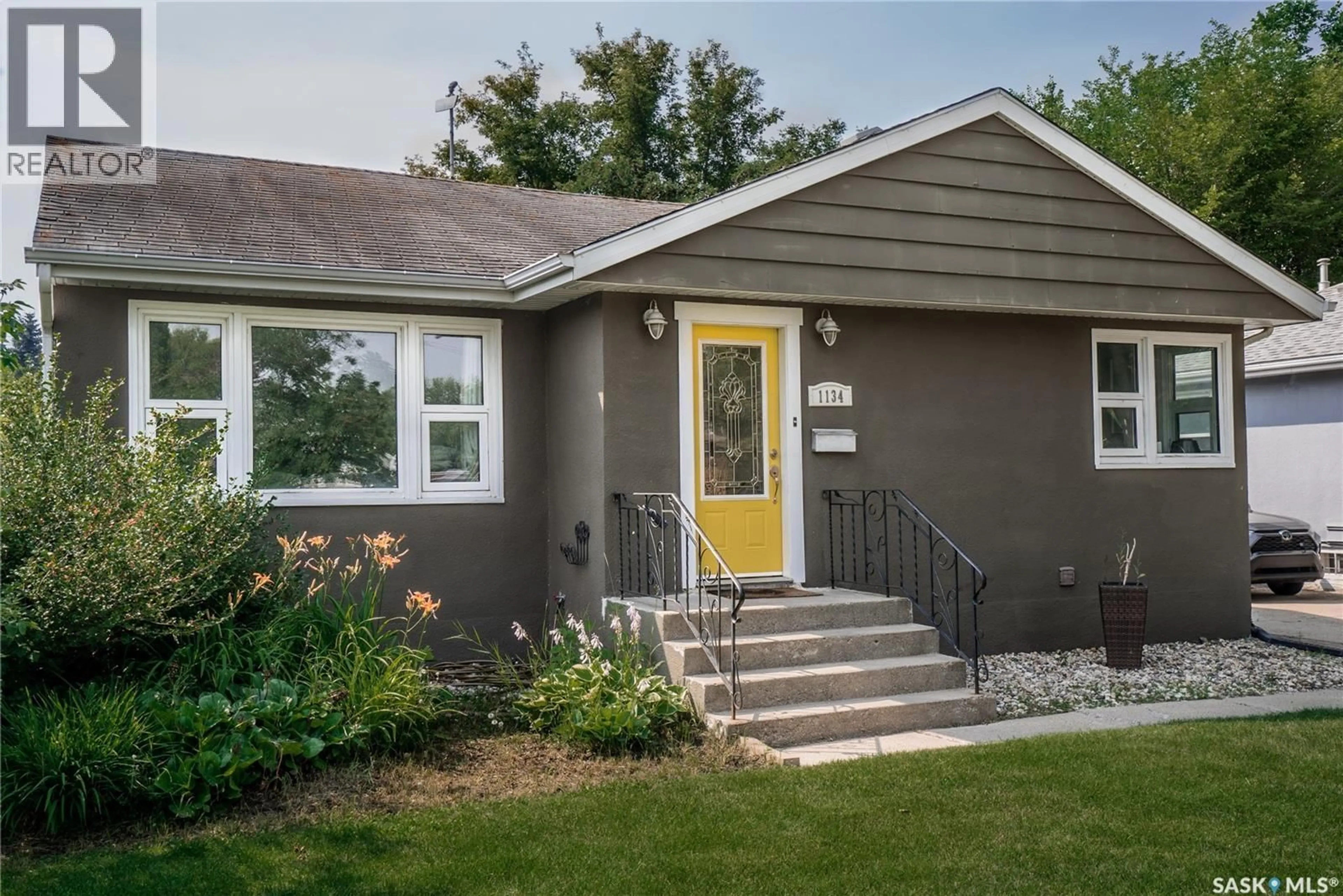 Home with vinyl exterior material, street for 1134 2ND STREET, Saskatoon Saskatchewan S7H1R5