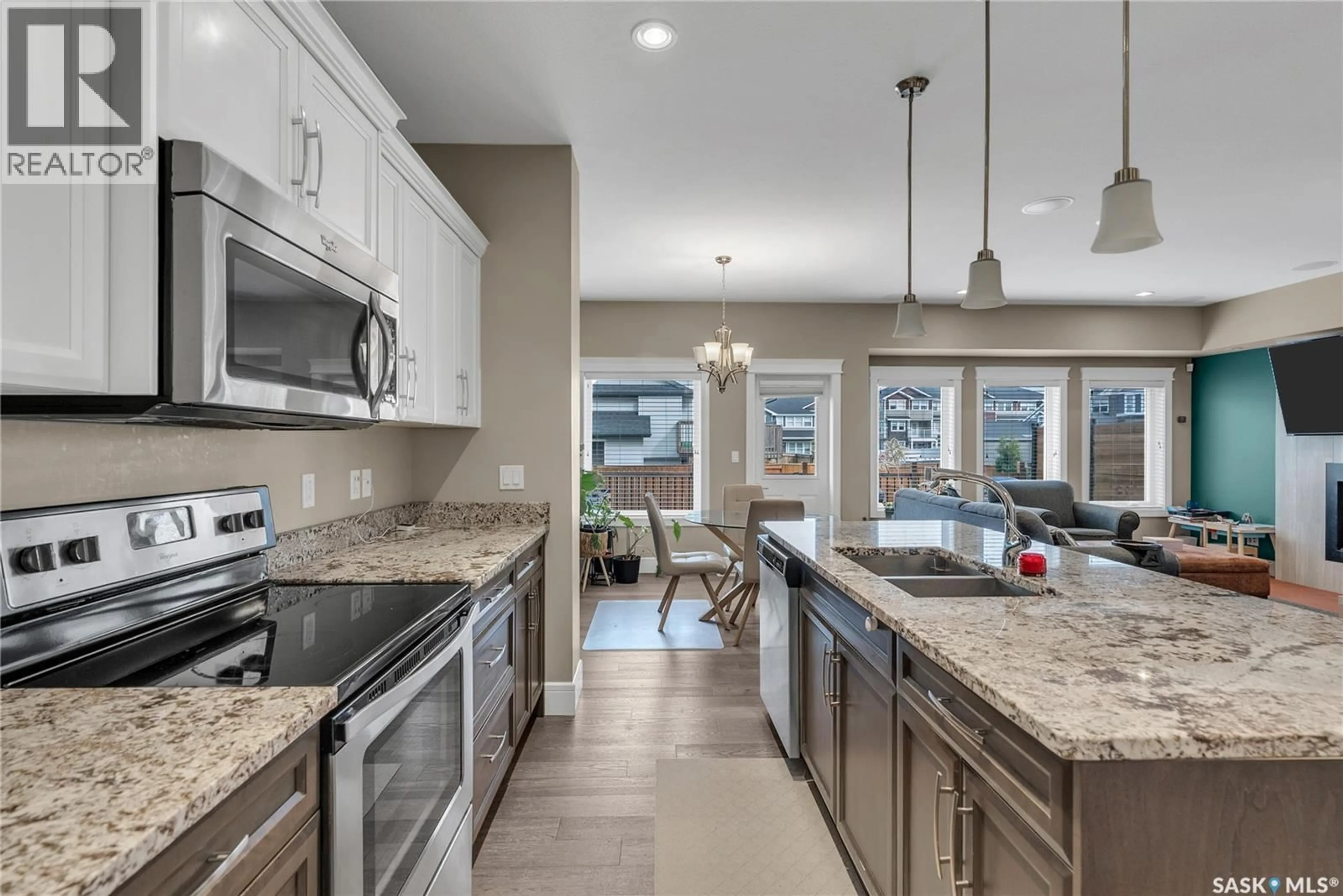 Open concept kitchen, ceramic/tile floor for 1147 PRINGLE WAY, Saskatoon Saskatchewan S7T1C9