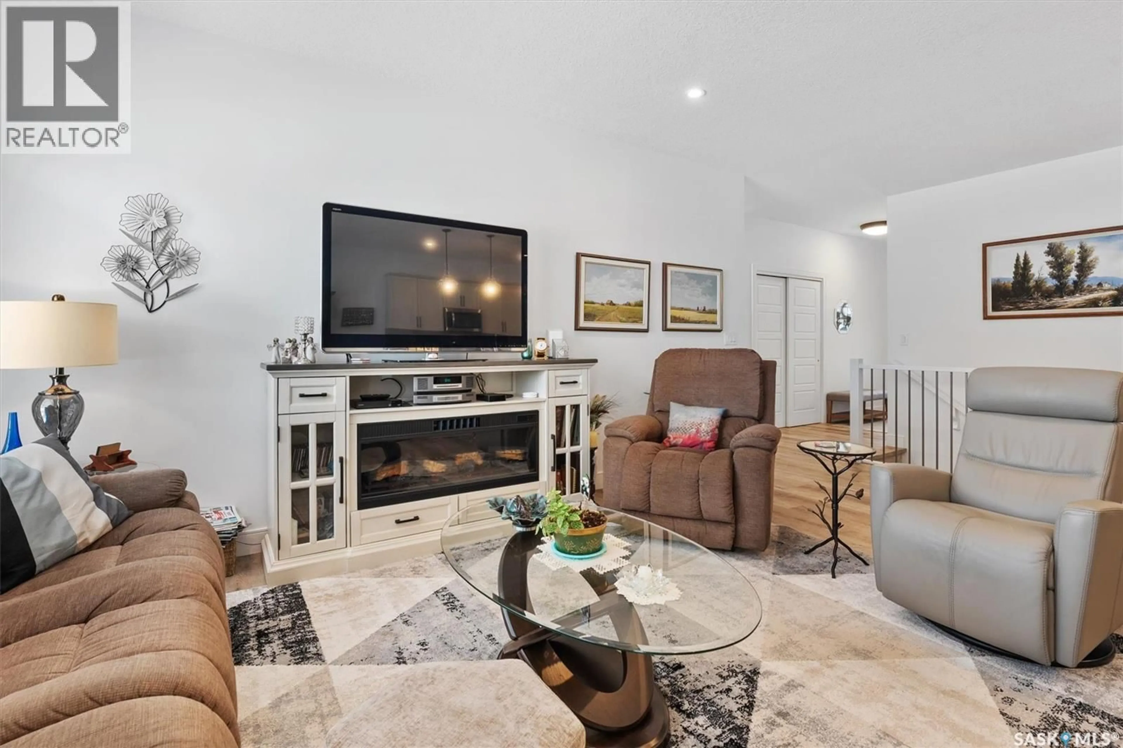 Living room with furniture, unknown for 4 - 310 EVERGREEN BOULEVARD, Saskatoon Saskatchewan S7W0Z1