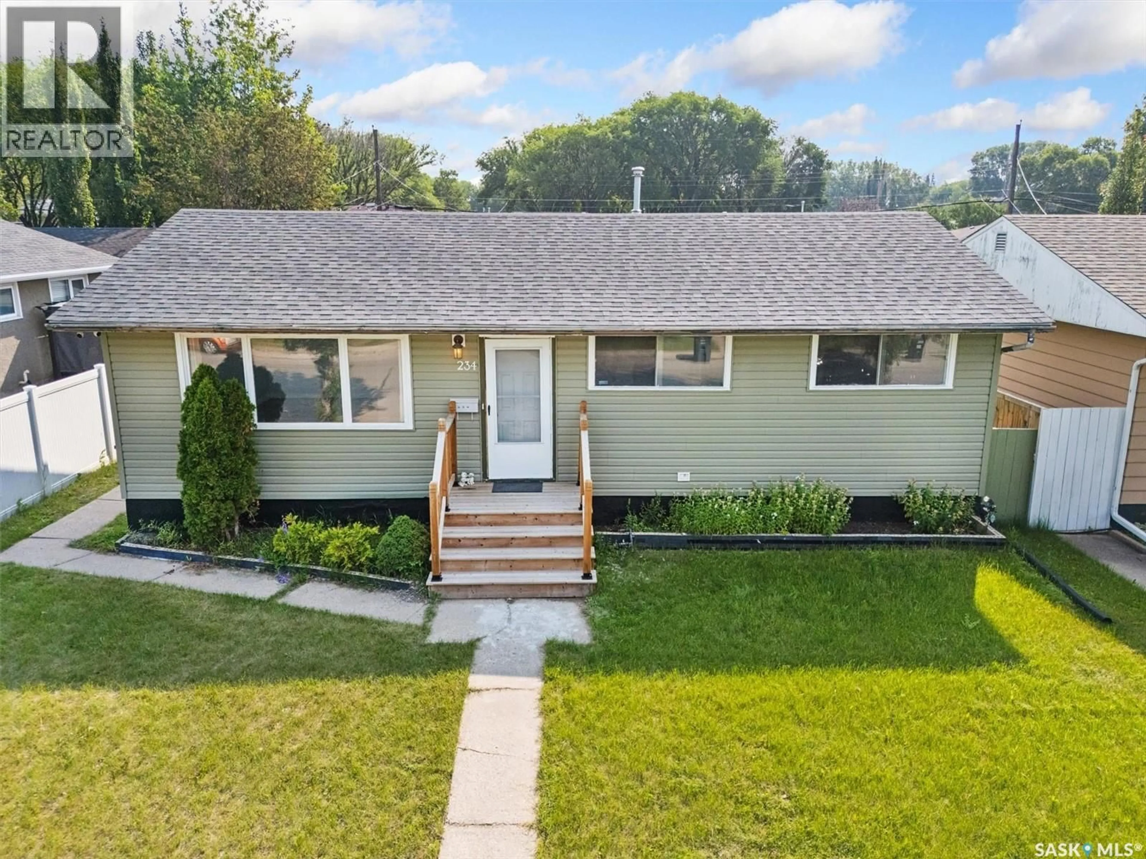 Home with vinyl exterior material, street for 234 WITNEY AVENUE, Saskatoon Saskatchewan S7L3M3