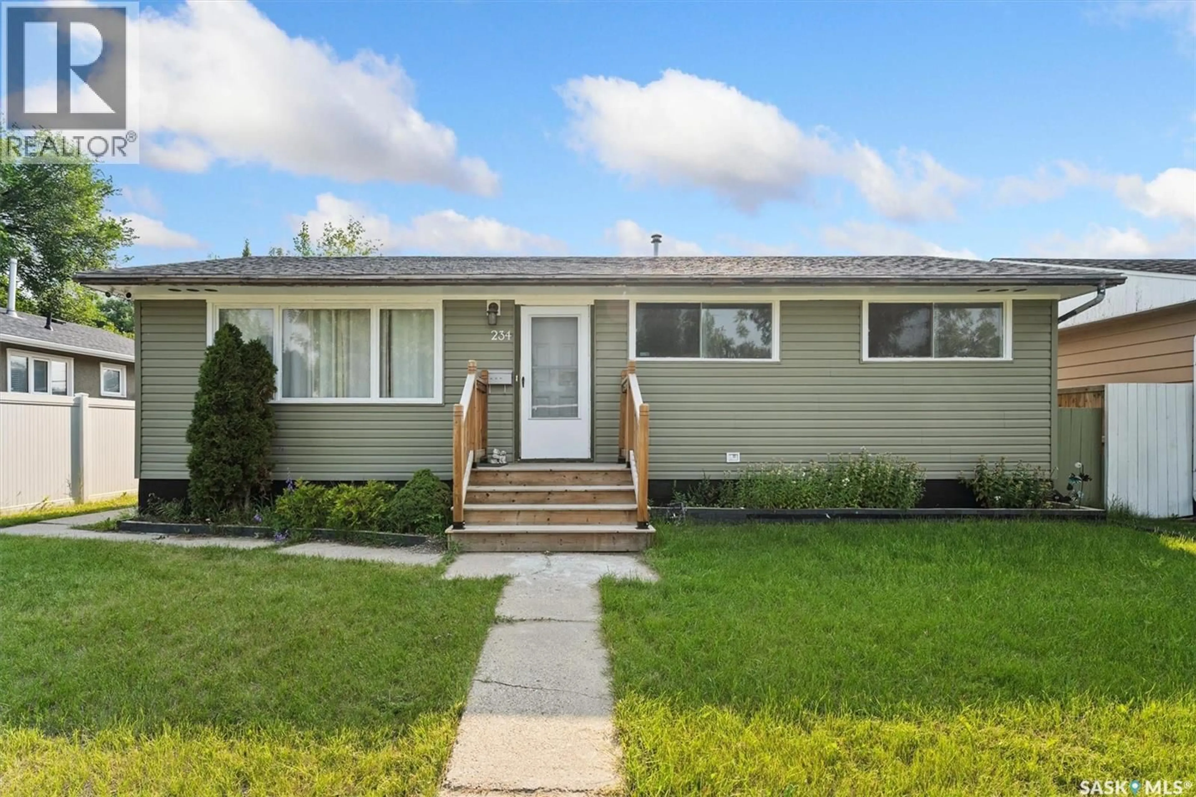 Home with vinyl exterior material, street for 234 WITNEY AVENUE, Saskatoon Saskatchewan S7L3M3