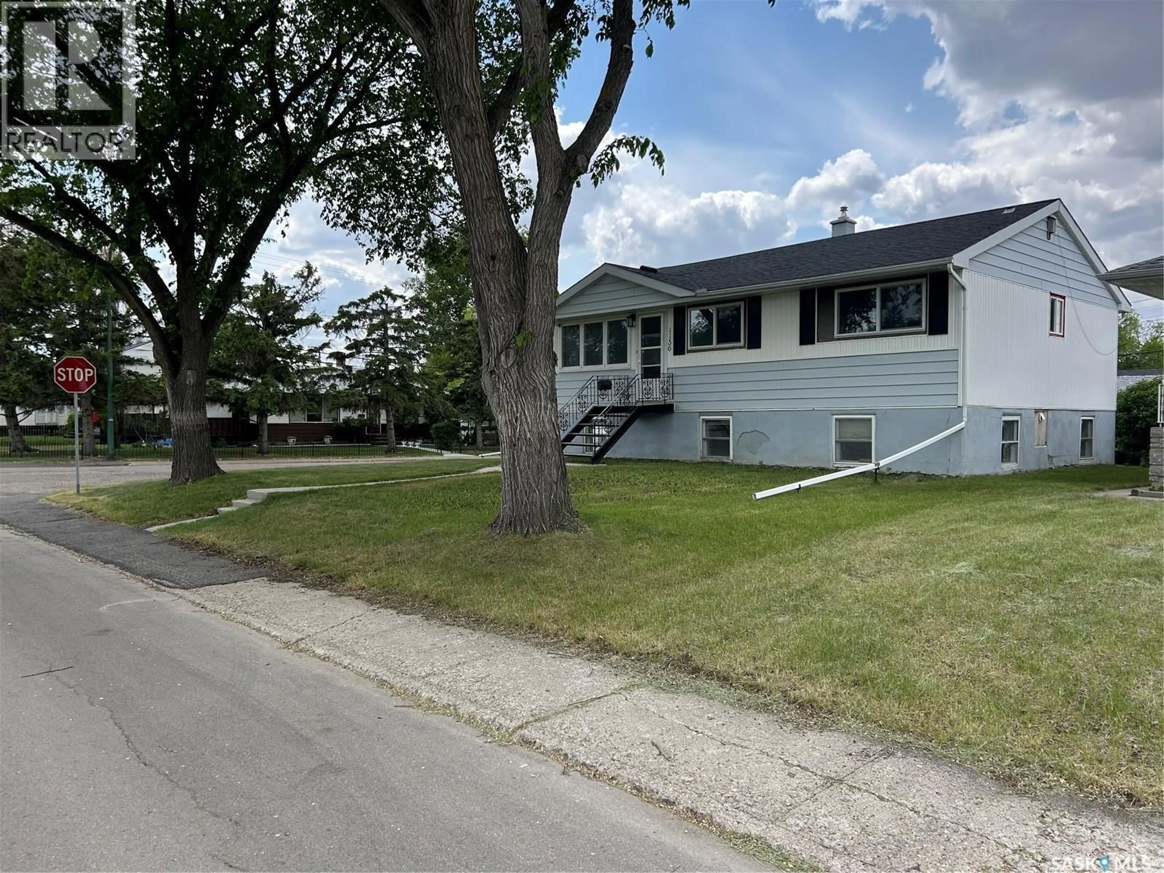 Home with vinyl exterior material, street for 1136 WALKER STREET, Regina Saskatchewan S4T5N4