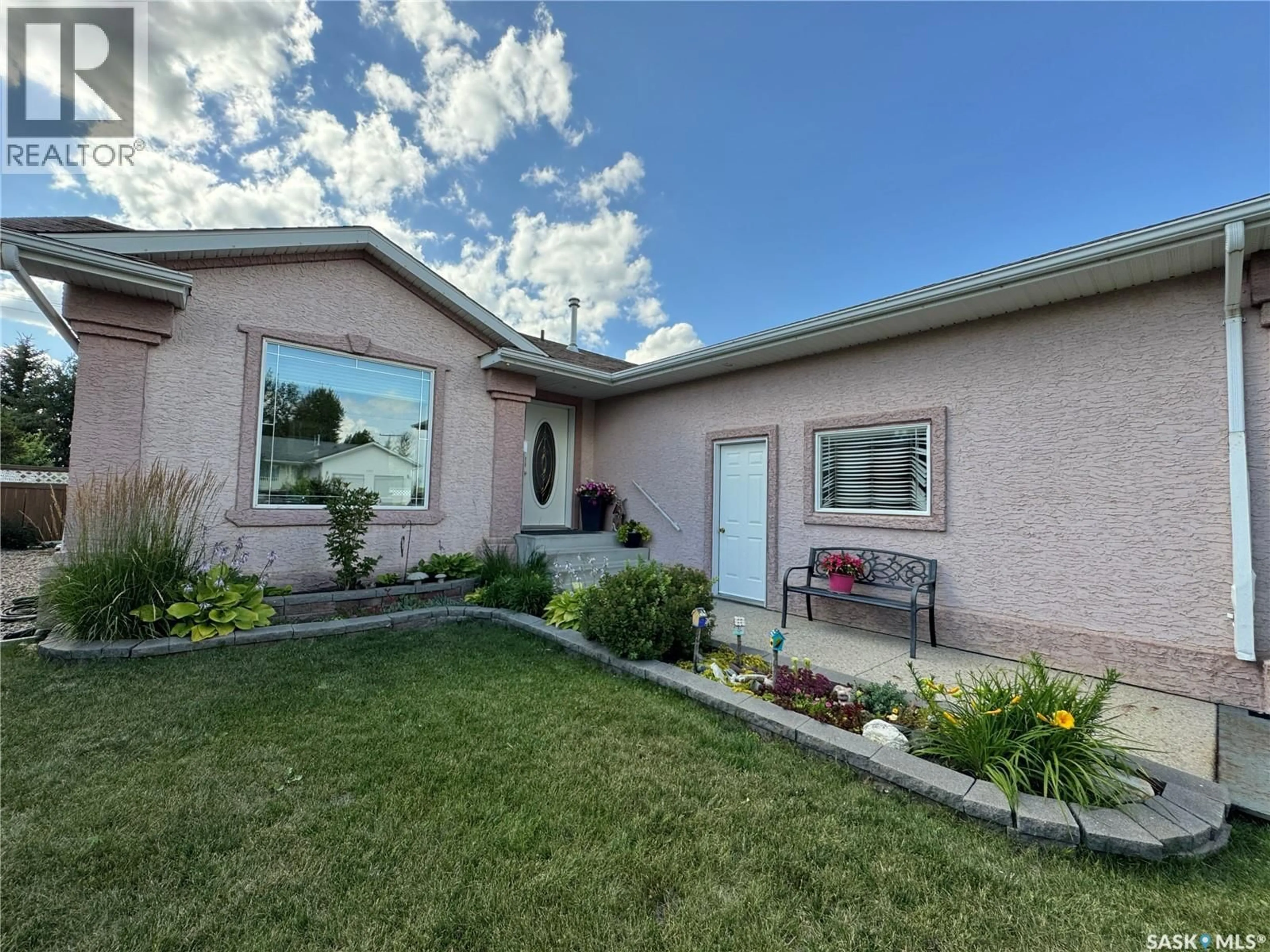 Home with vinyl exterior material, street for 1215 21ST STREET, Humboldt Saskatchewan S0K2A0