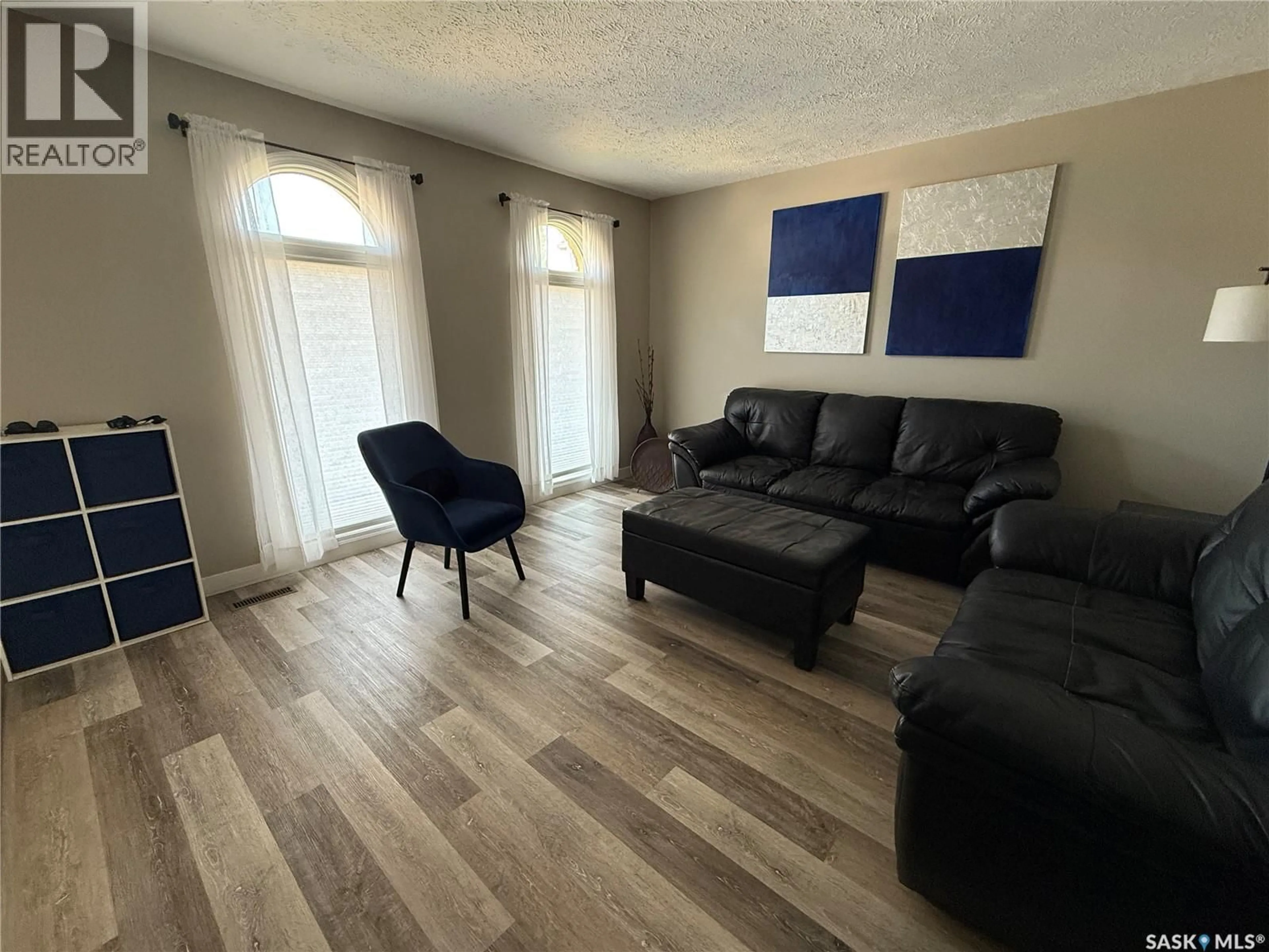 Living room with furniture, unknown for 207 9TH STREET, Weyburn Saskatchewan S4H1E9