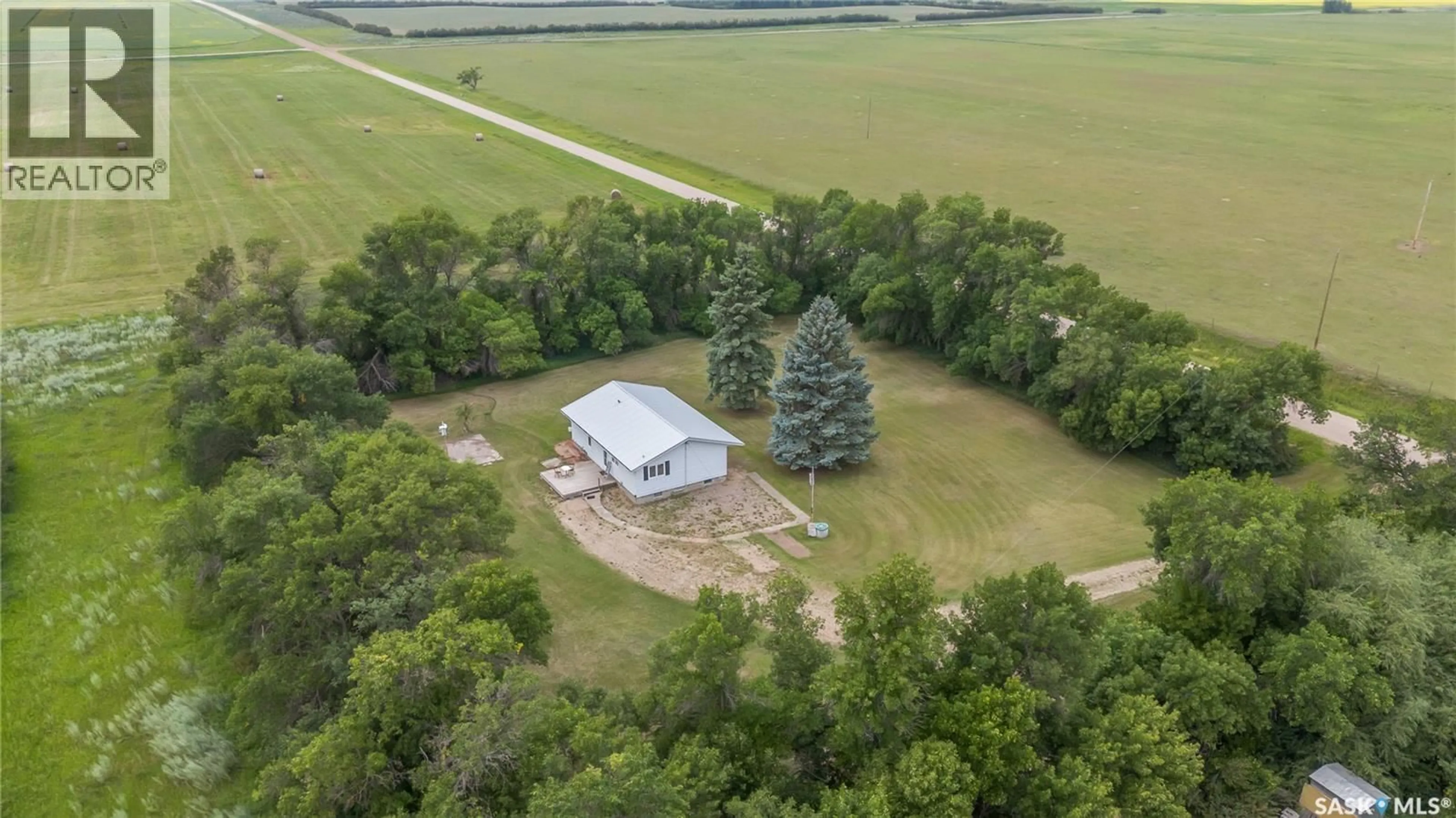 A pic from outside/outdoor area/front of a property/back of a property/a pic from drone, building for HAPPY SCHOOL ACREAGE, Lost River Rm No. 313 Saskatchewan S0K0C0
