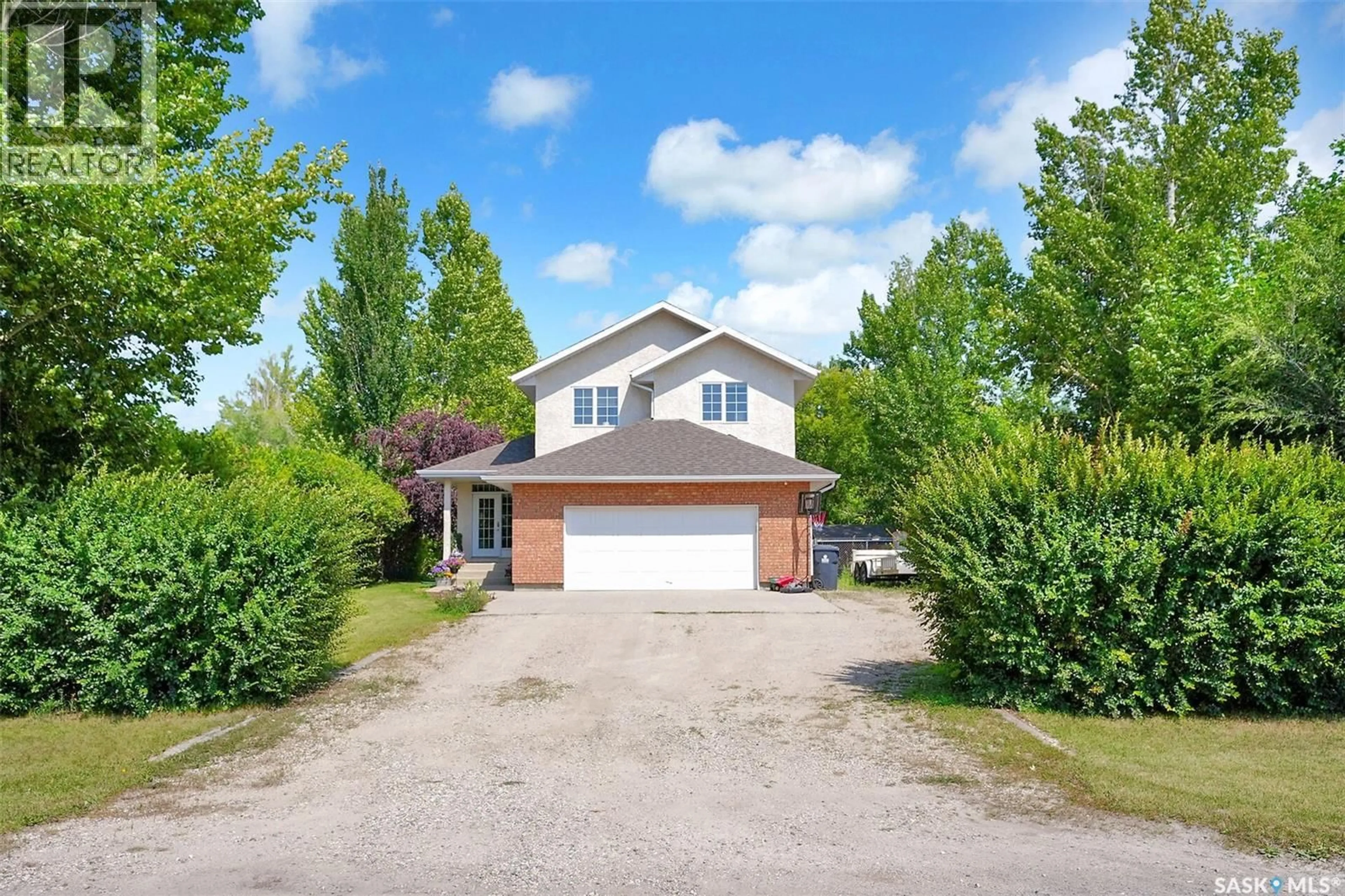 A pic from outside/outdoor area/front of a property/back of a property/a pic from drone, street for 3 LOTT ROAD, White City Saskatchewan S4L5B1