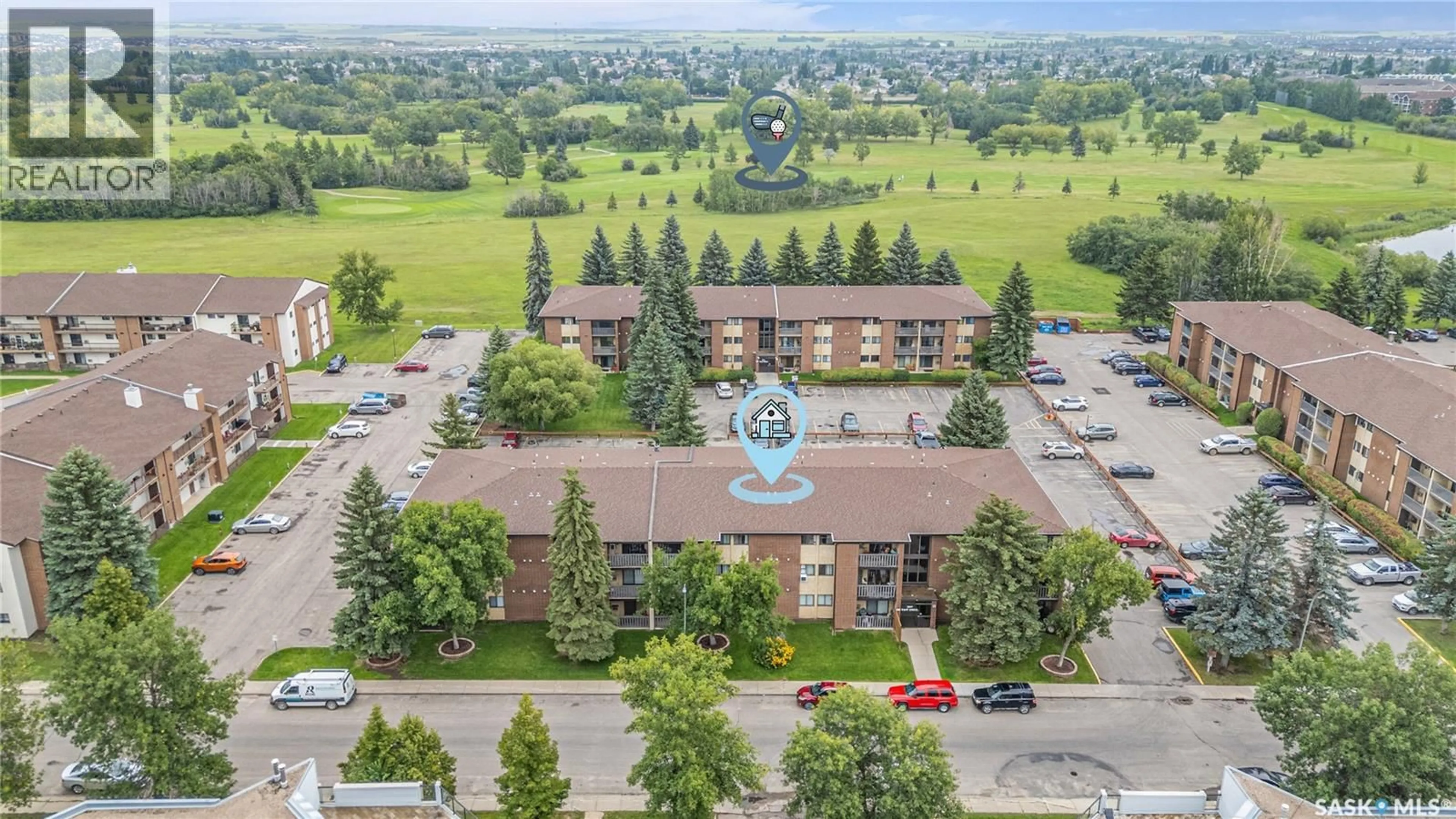 A pic from outside/outdoor area/front of a property/back of a property/a pic from drone, unknown for 204 - 307 TAIT CRESCENT, Saskatoon Saskatchewan S7H5L6