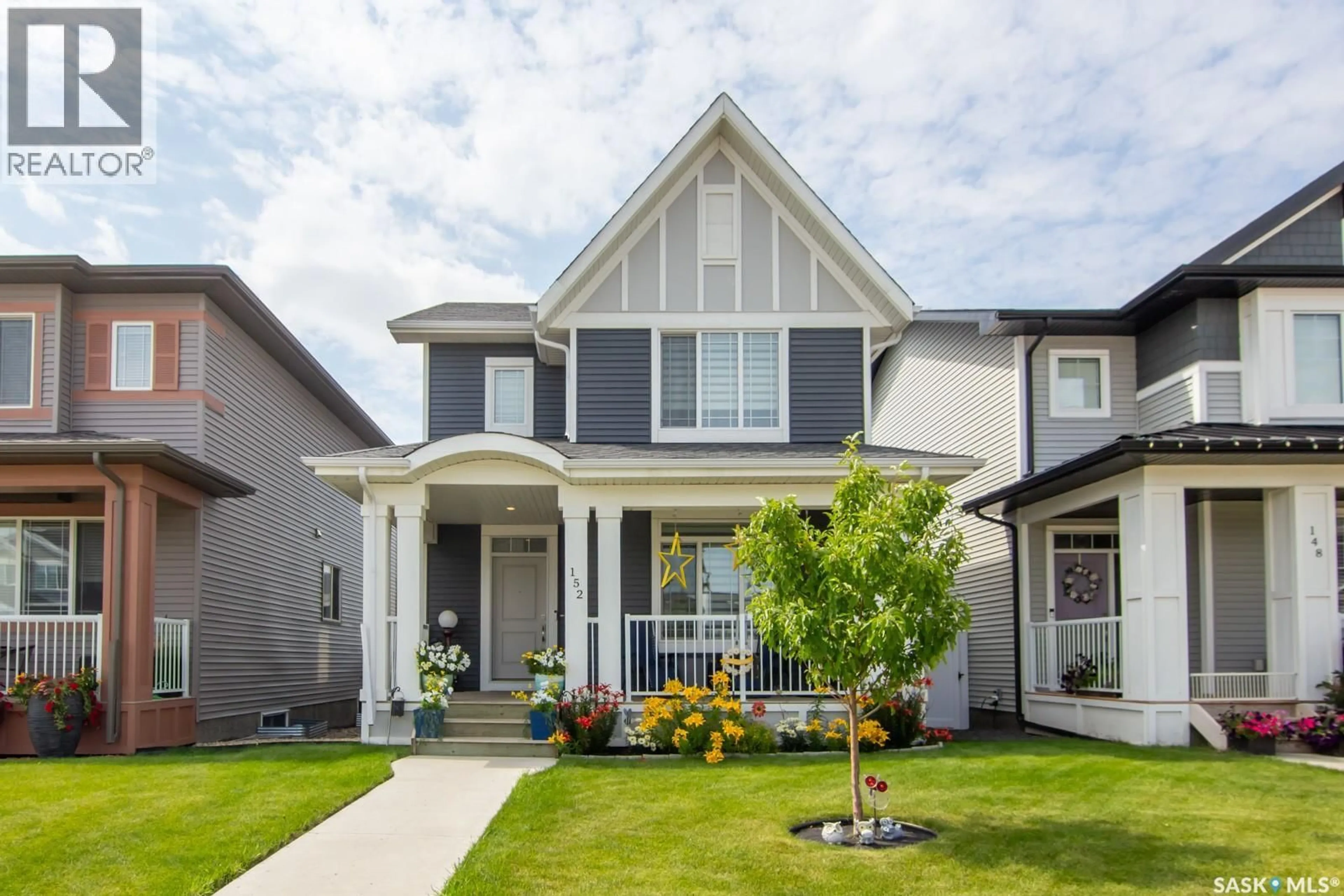 Home with vinyl exterior material, street for 152 DUBOIS CRESCENT, Saskatoon Saskatchewan S7V0R5