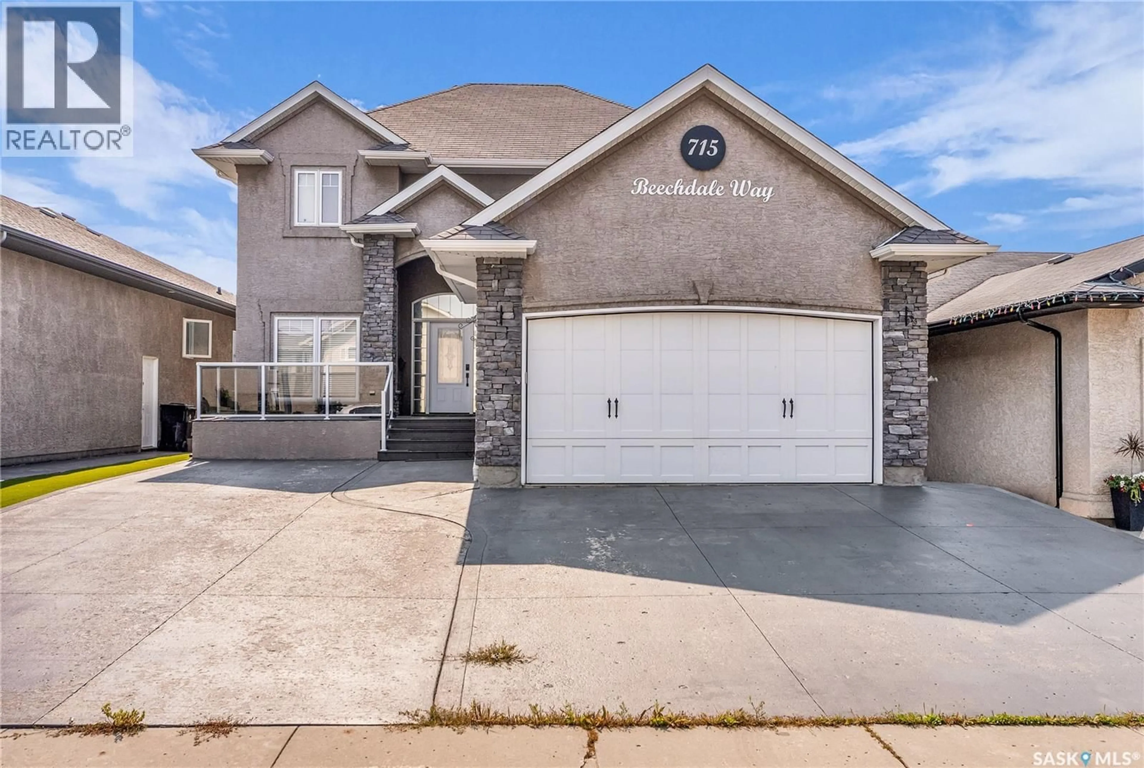 Home with brick exterior material, street for 715 BEECHDALE WAY, Saskatoon Saskatchewan S7V0A5