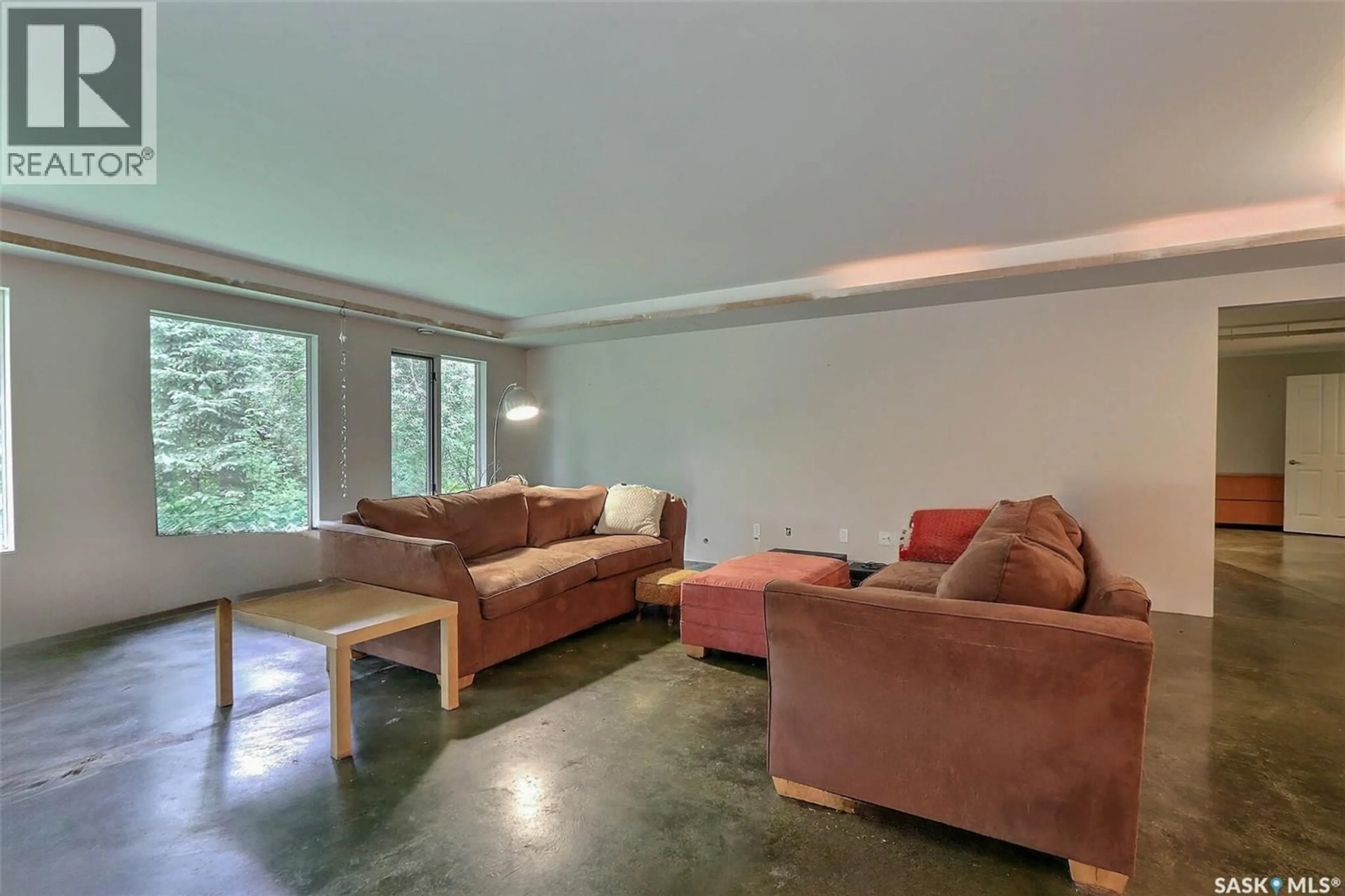 Living room with furniture, cement floor for 4 PARKLAND ROAD, Candle Lake Saskatchewan S0J3E0