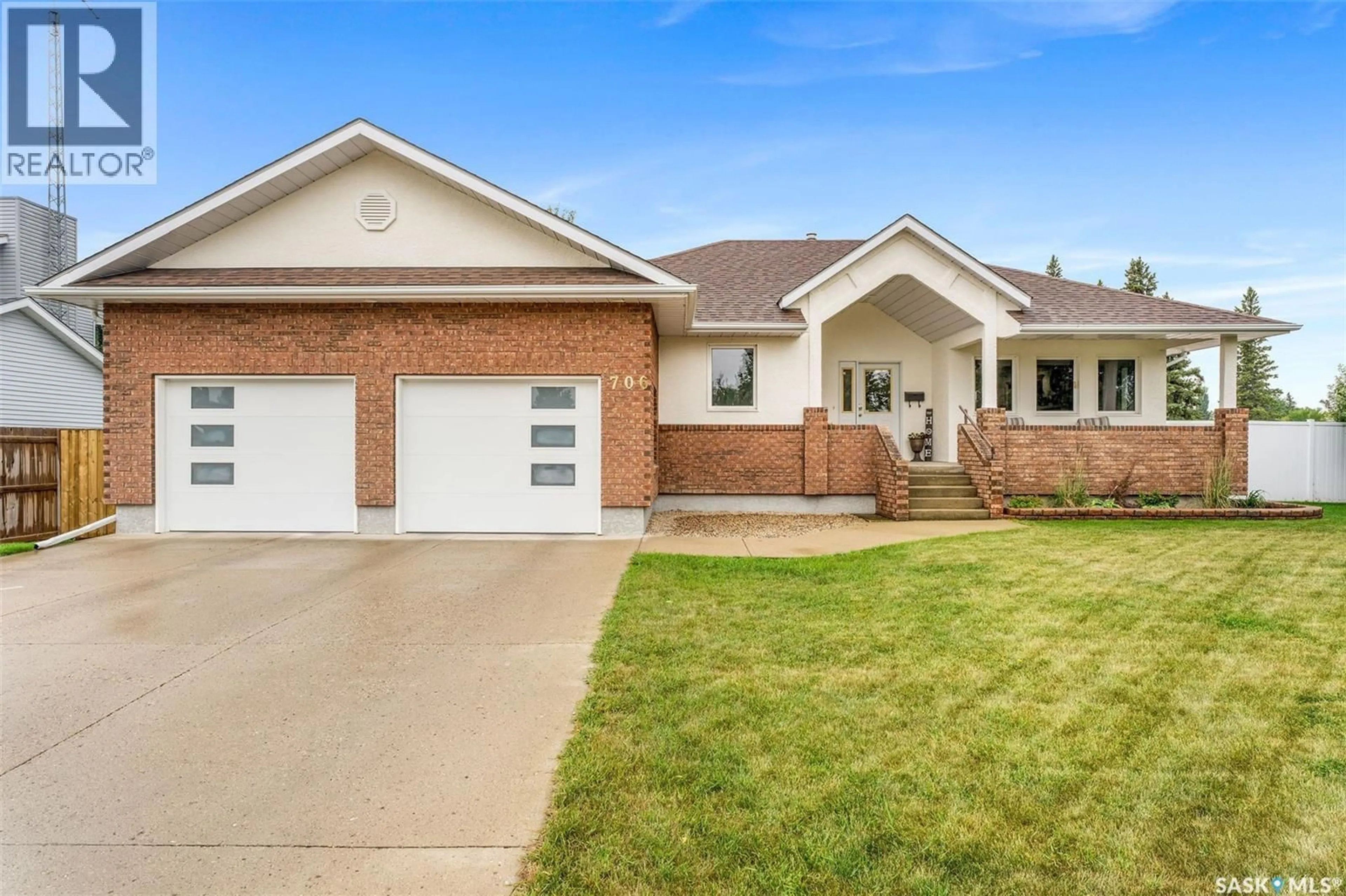 Home with brick exterior material, street for 706 13TH AVENUE, Humboldt Saskatchewan S0K2A0
