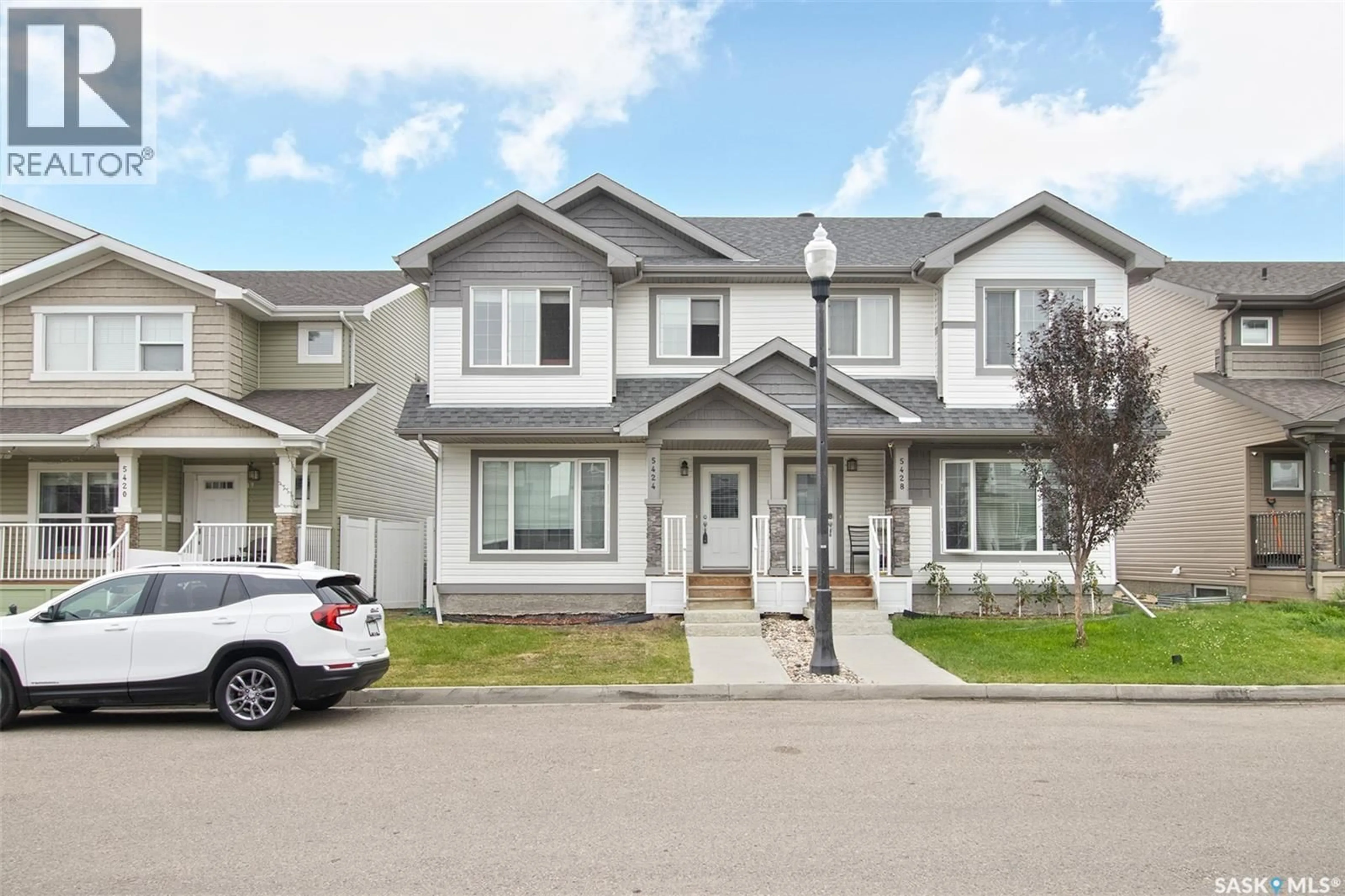 Home with vinyl exterior material, street for 5424 GREEN SILVERBERRY DRIVE, Regina Saskatchewan S4V3M4