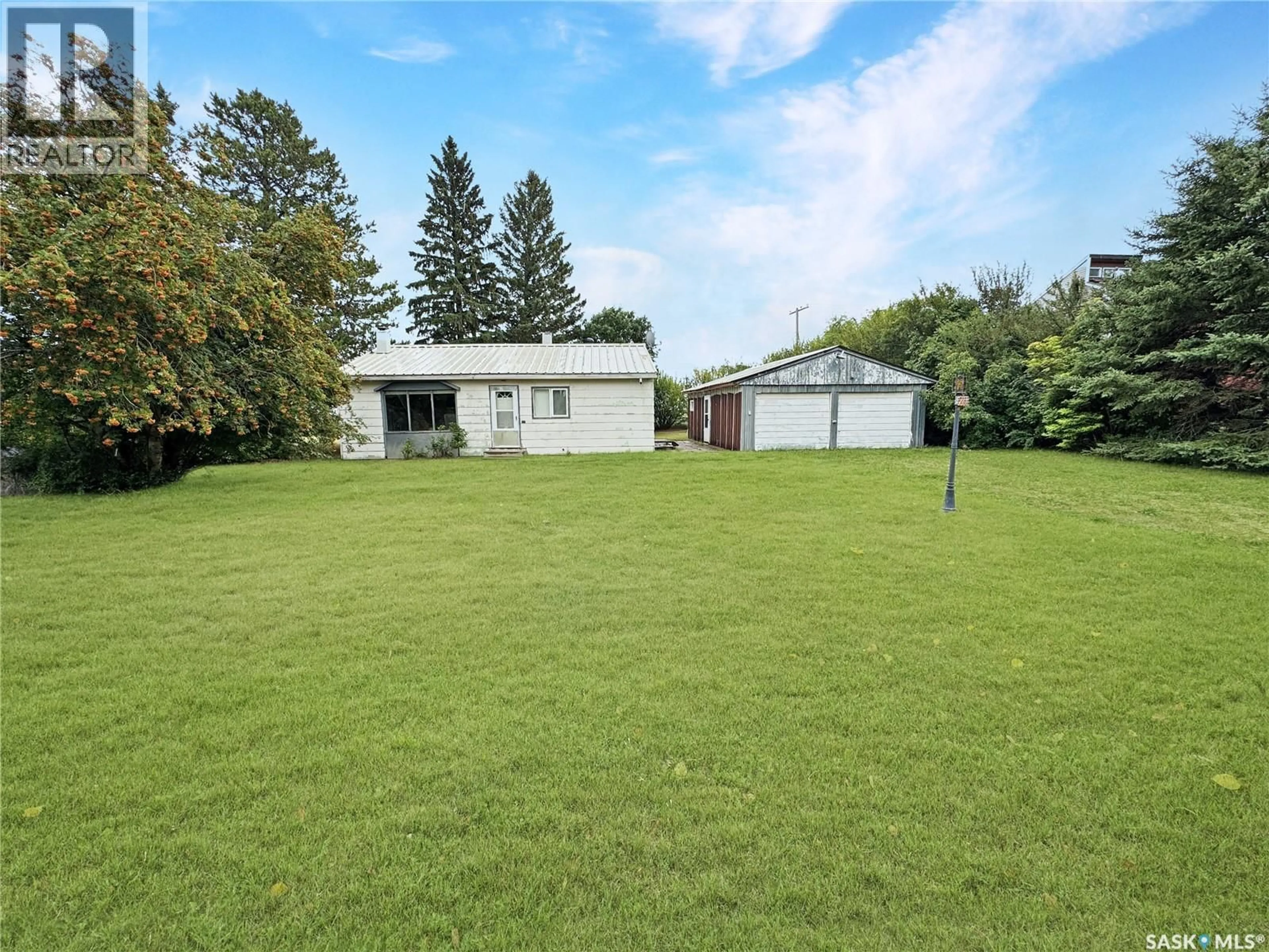 A pic from outside/outdoor area/front of a property/back of a property/a pic from drone, unknown for 211 MUNICIPAL ROAD, Paynton Saskatchewan S0M2J0