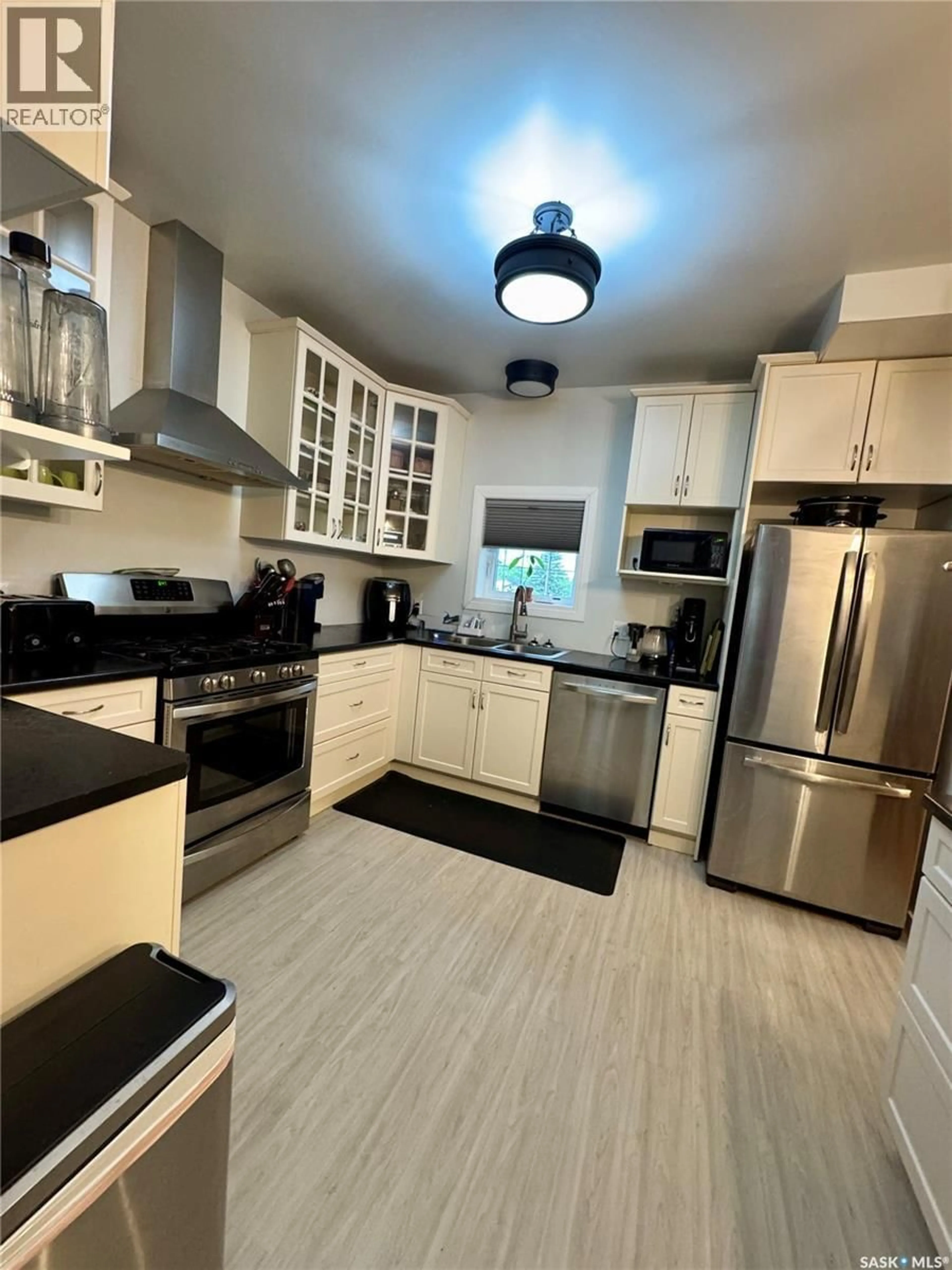 Open concept kitchen, ceramic/tile floor for 415 PRINCE STREET, Hudson Bay Saskatchewan S0E0Y0