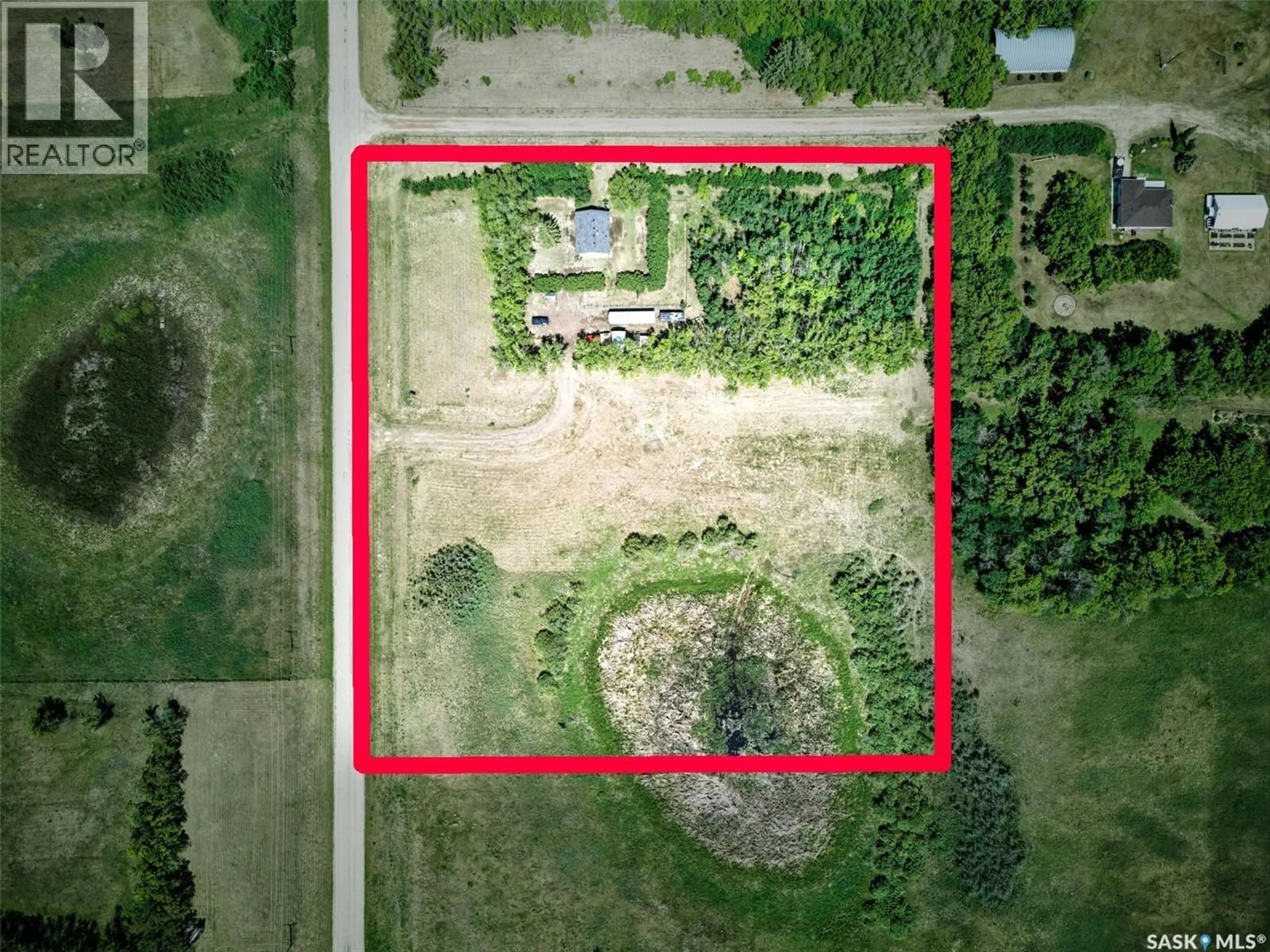 A pic from outside/outdoor area/front of a property/back of a property/a pic from drone, building for MCKENZIE ACREAGE, Dundurn Rm No. 314 Saskatchewan S7C0E2