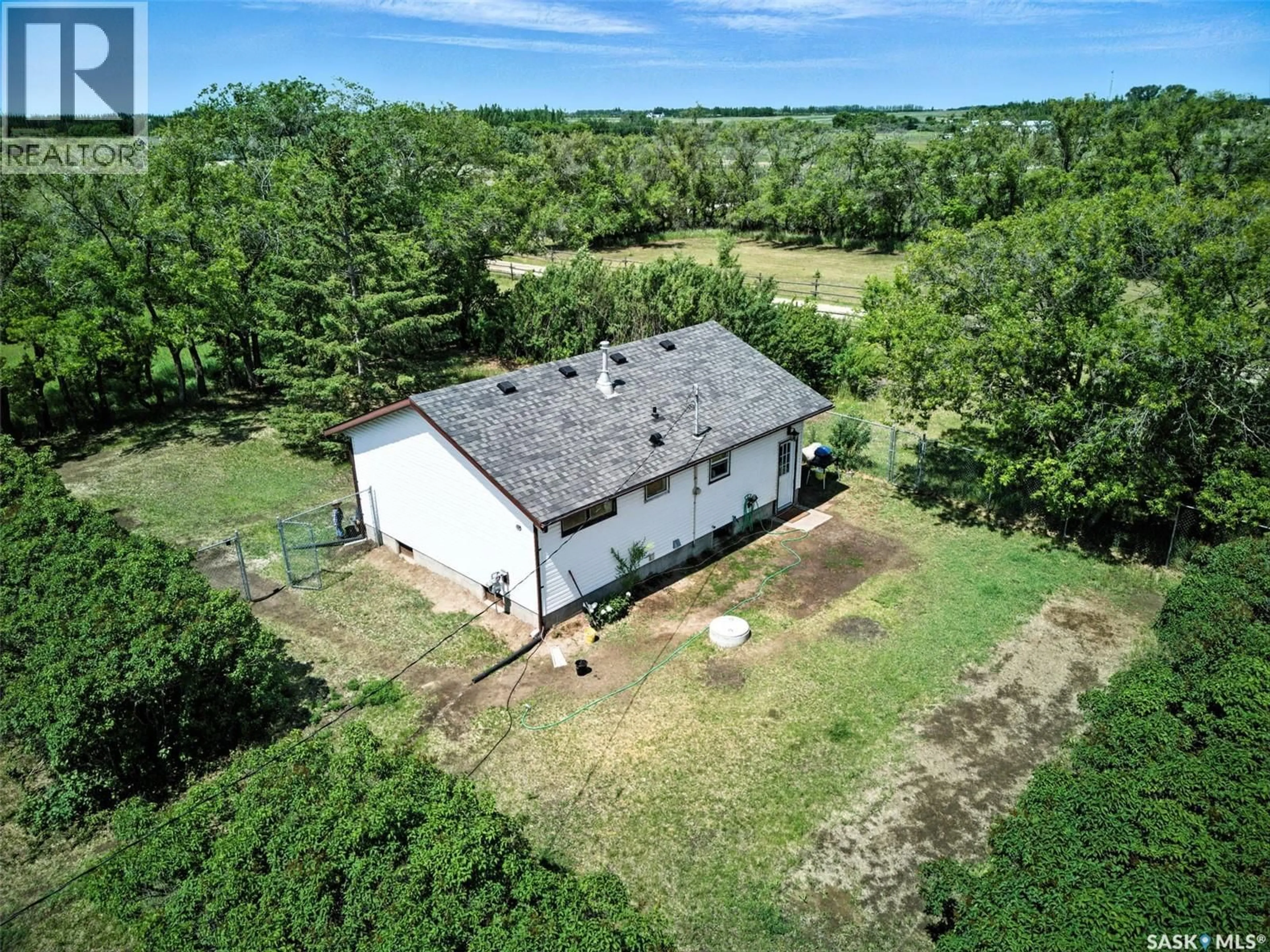 A pic from outside/outdoor area/front of a property/back of a property/a pic from drone, building for MCKENZIE ACREAGE, Dundurn Rm No. 314 Saskatchewan S7C0E2