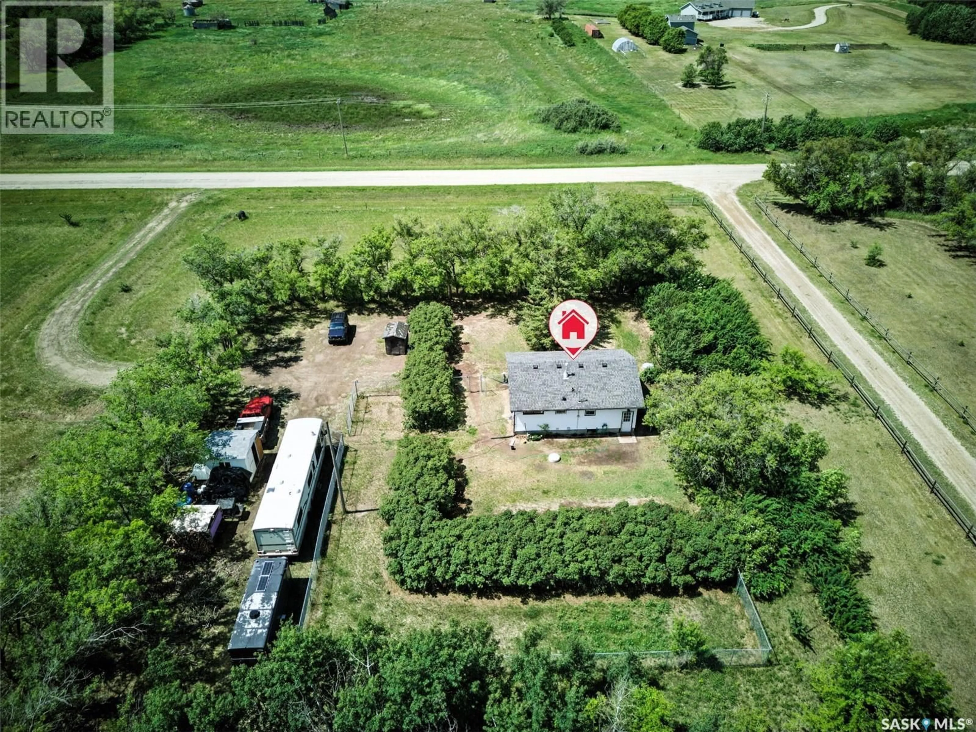 A pic from outside/outdoor area/front of a property/back of a property/a pic from drone, building for MCKENZIE ACREAGE, Dundurn Rm No. 314 Saskatchewan S7C0E2