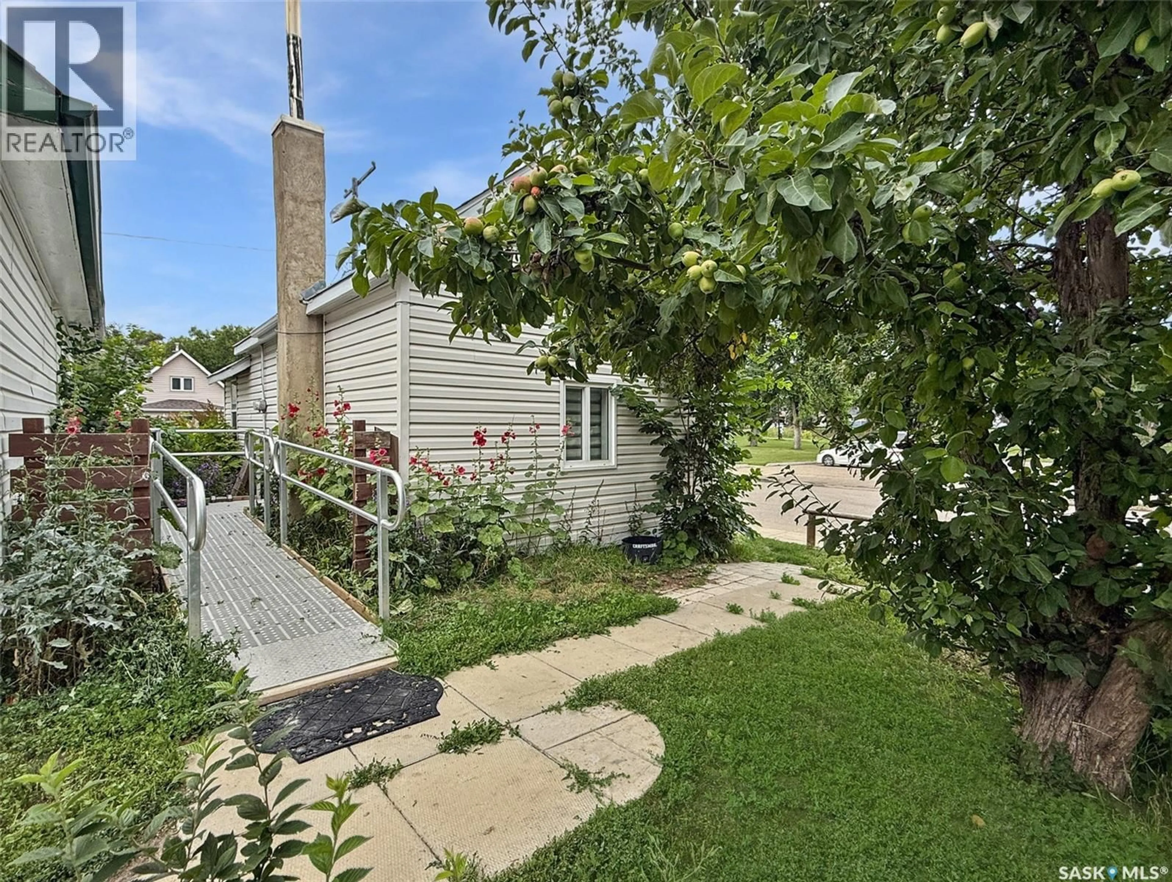 A pic from outside/outdoor area/front of a property/back of a property/a pic from drone, street for 245 8TH AVENUE, Swift Current Saskatchewan S9H2P5