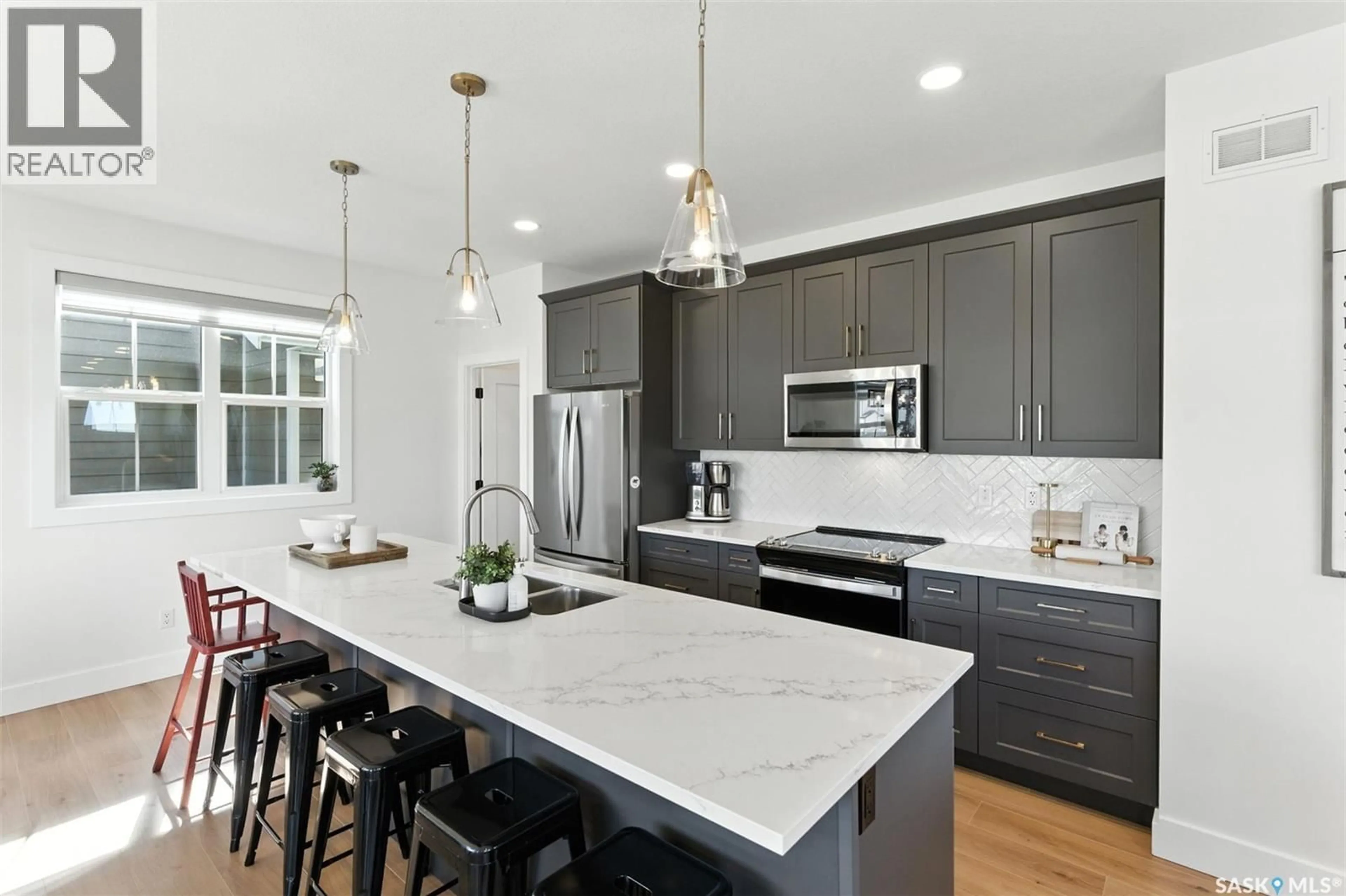 Open concept kitchen, ceramic/tile floor for 235 DZIADYK MANOR, Saskatoon Saskatchewan S7V1M5