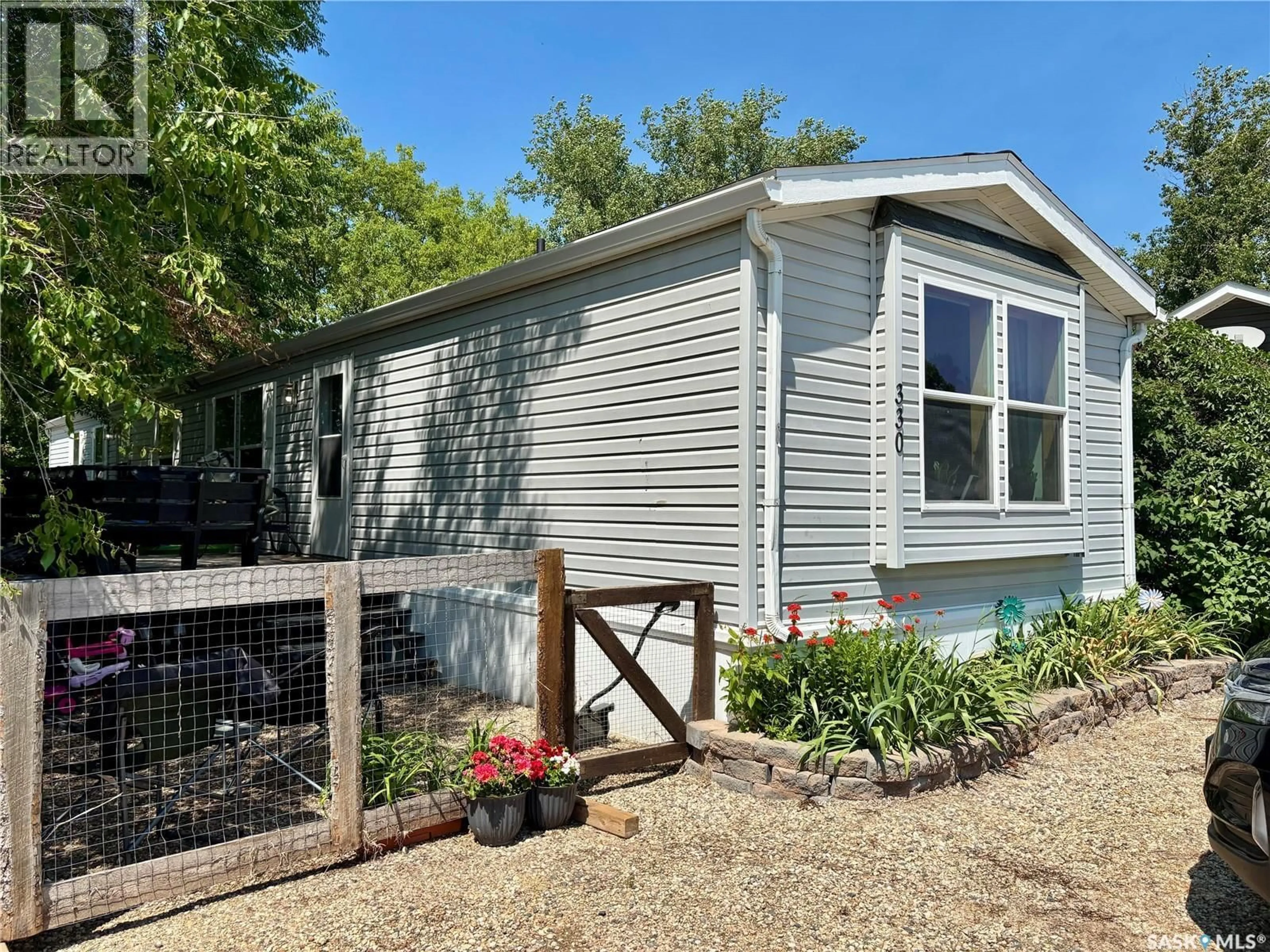 Home with vinyl exterior material, street for 330 MAIN STREET, Kennedy Saskatchewan S0G2R0