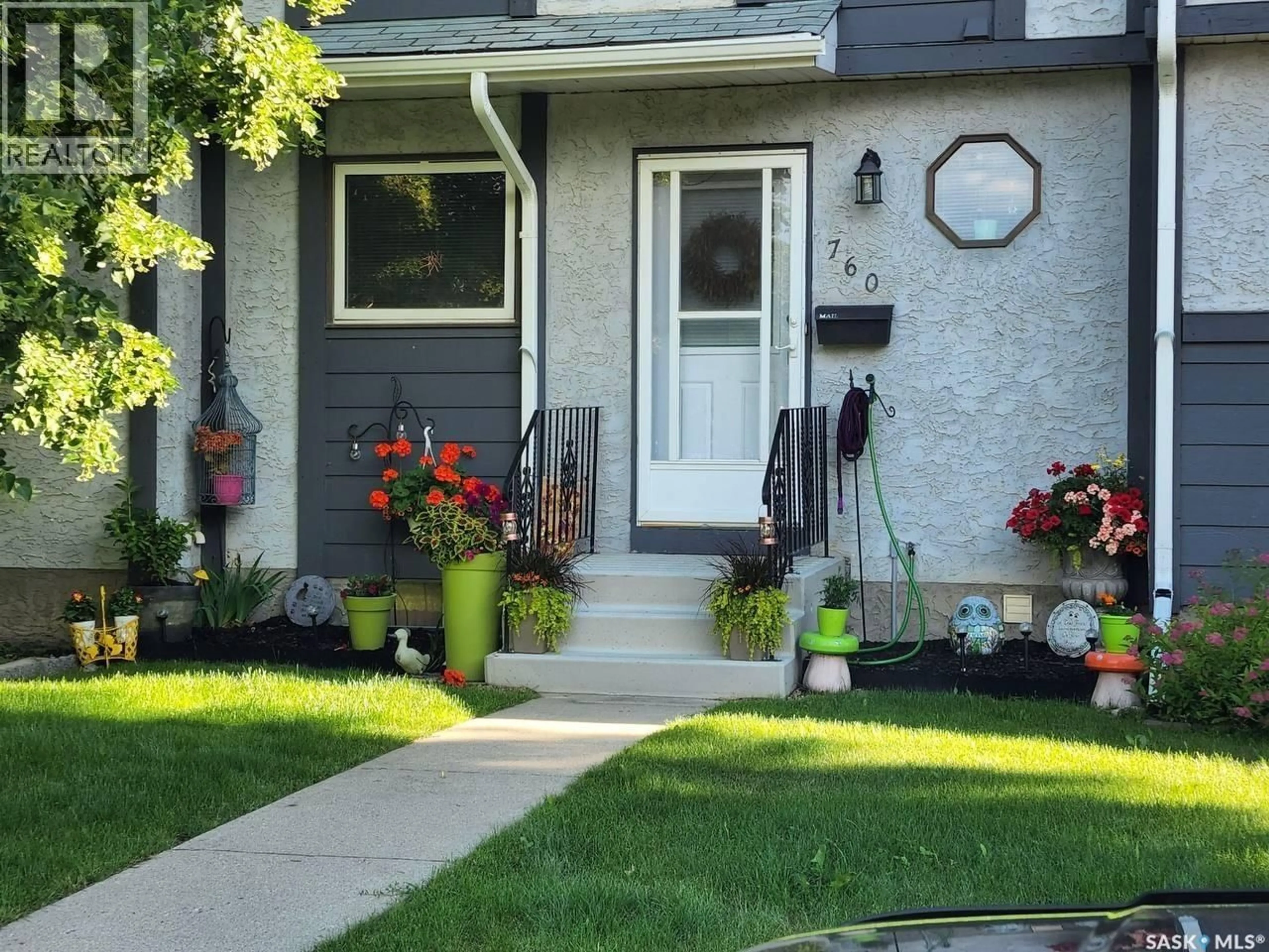 Home with vinyl exterior material, street for 140 - 760 MEILICKE ROAD, Saskatoon Saskatchewan S7K7Y5