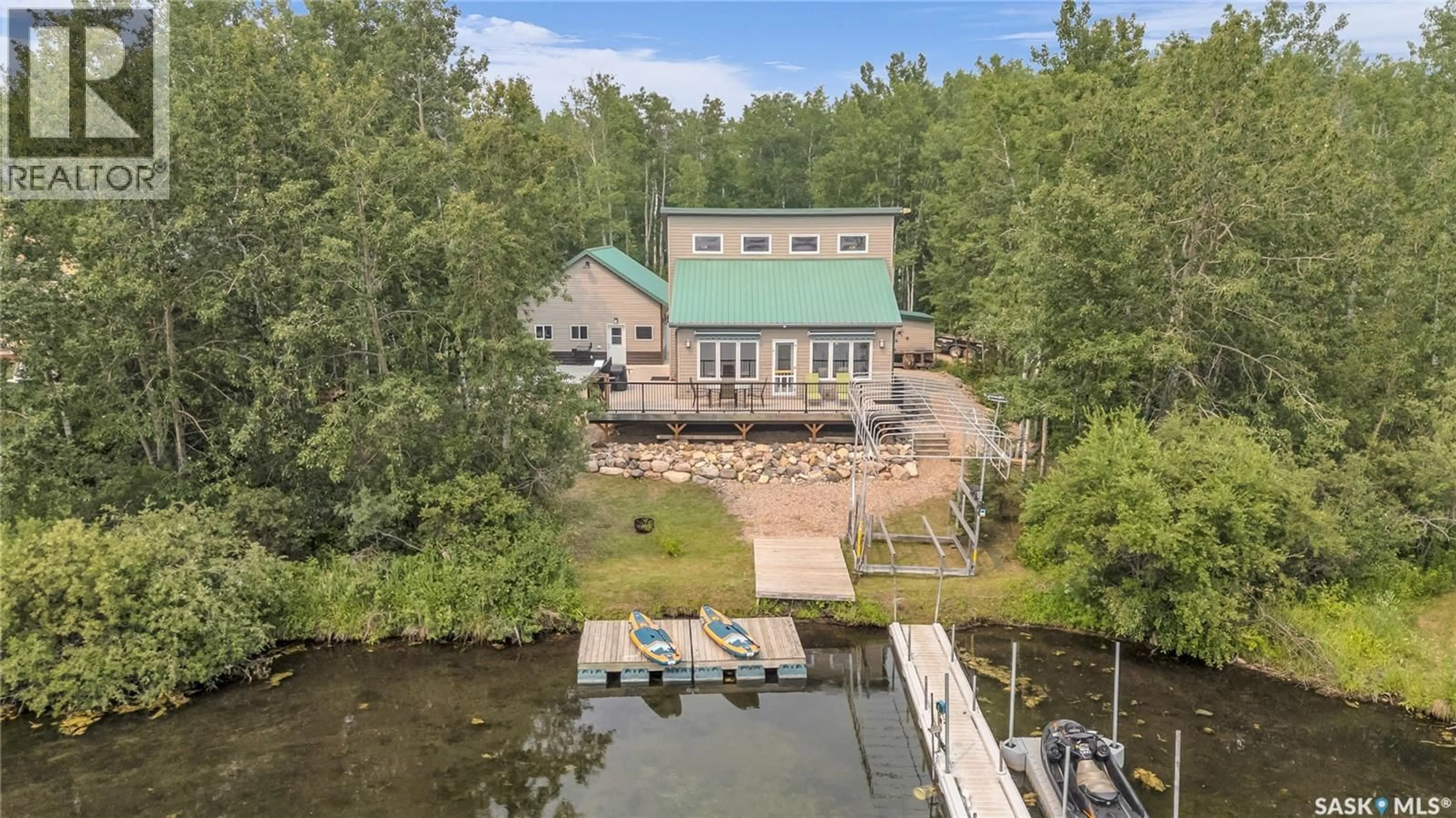 A pic from outside/outdoor area/front of a property/back of a property/a pic from drone, water/lake/river/ocean view for 8 MISTY BAY DRIVE, Big Shell Saskatchewan S0J2G0