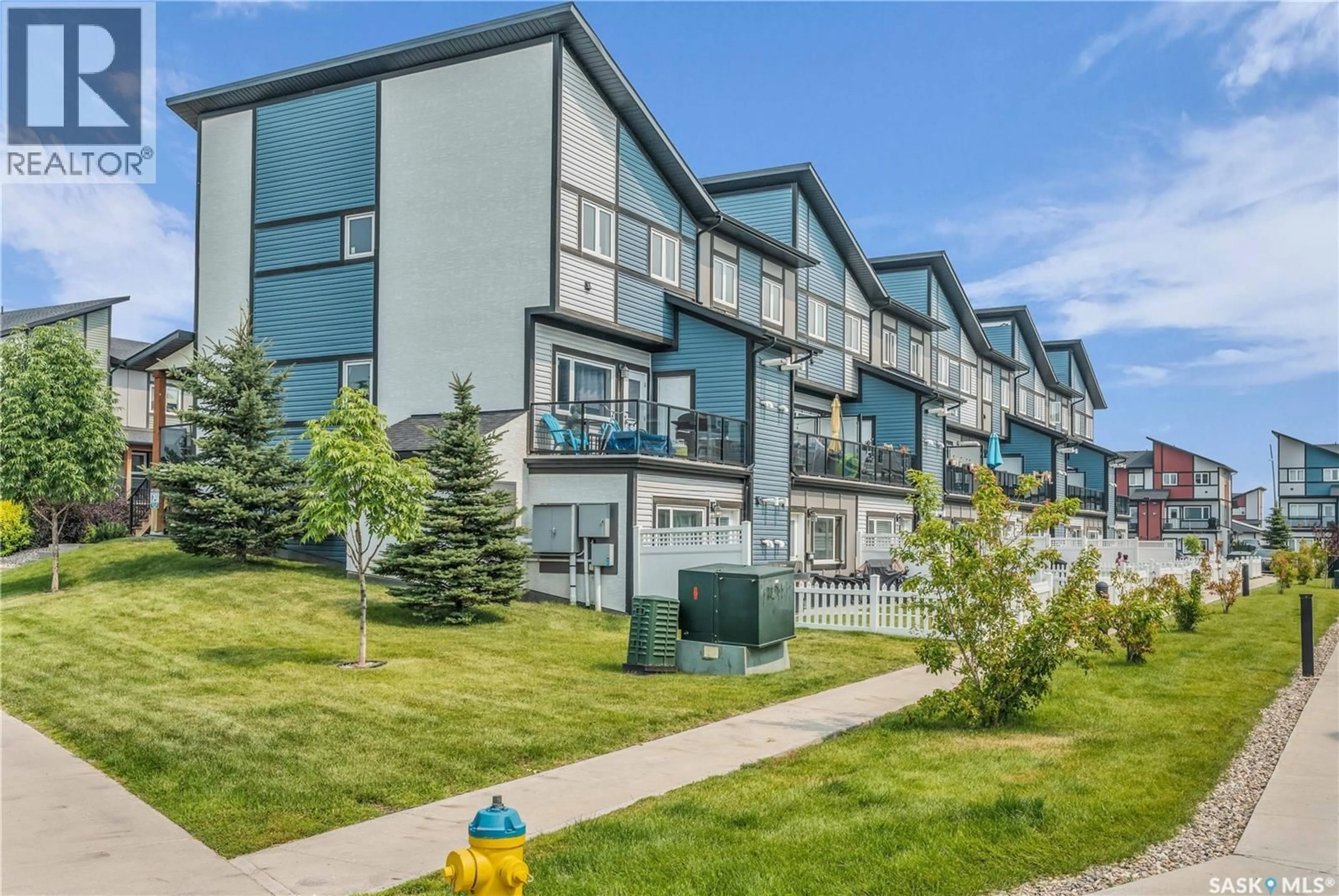 A pic from outside/outdoor area/front of a property/back of a property/a pic from drone, mountain view for 130 - 1215 MARLATTE CRESCENT, Saskatoon Saskatchewan S7W0W1