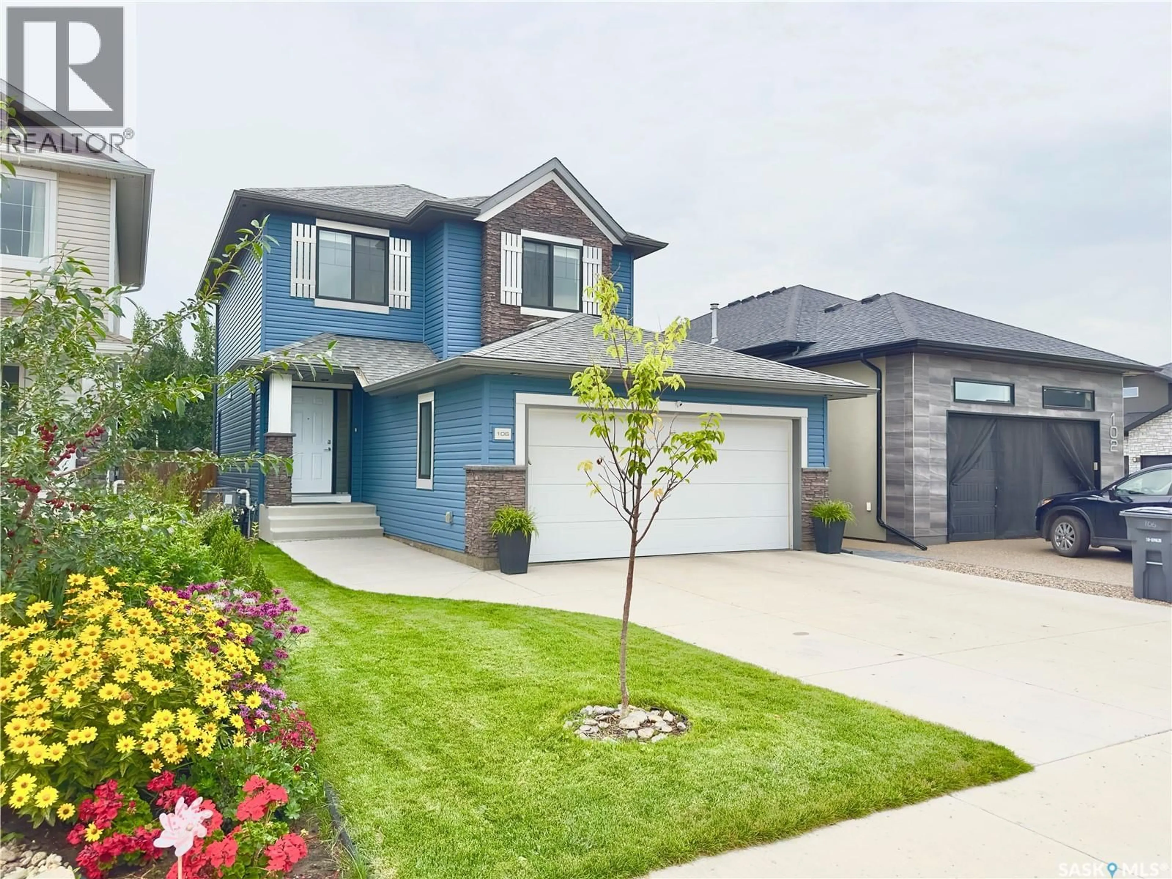 Home with vinyl exterior material, street for 106 BURGESS CRESCENT, Saskatoon Saskatchewan S7V0S1