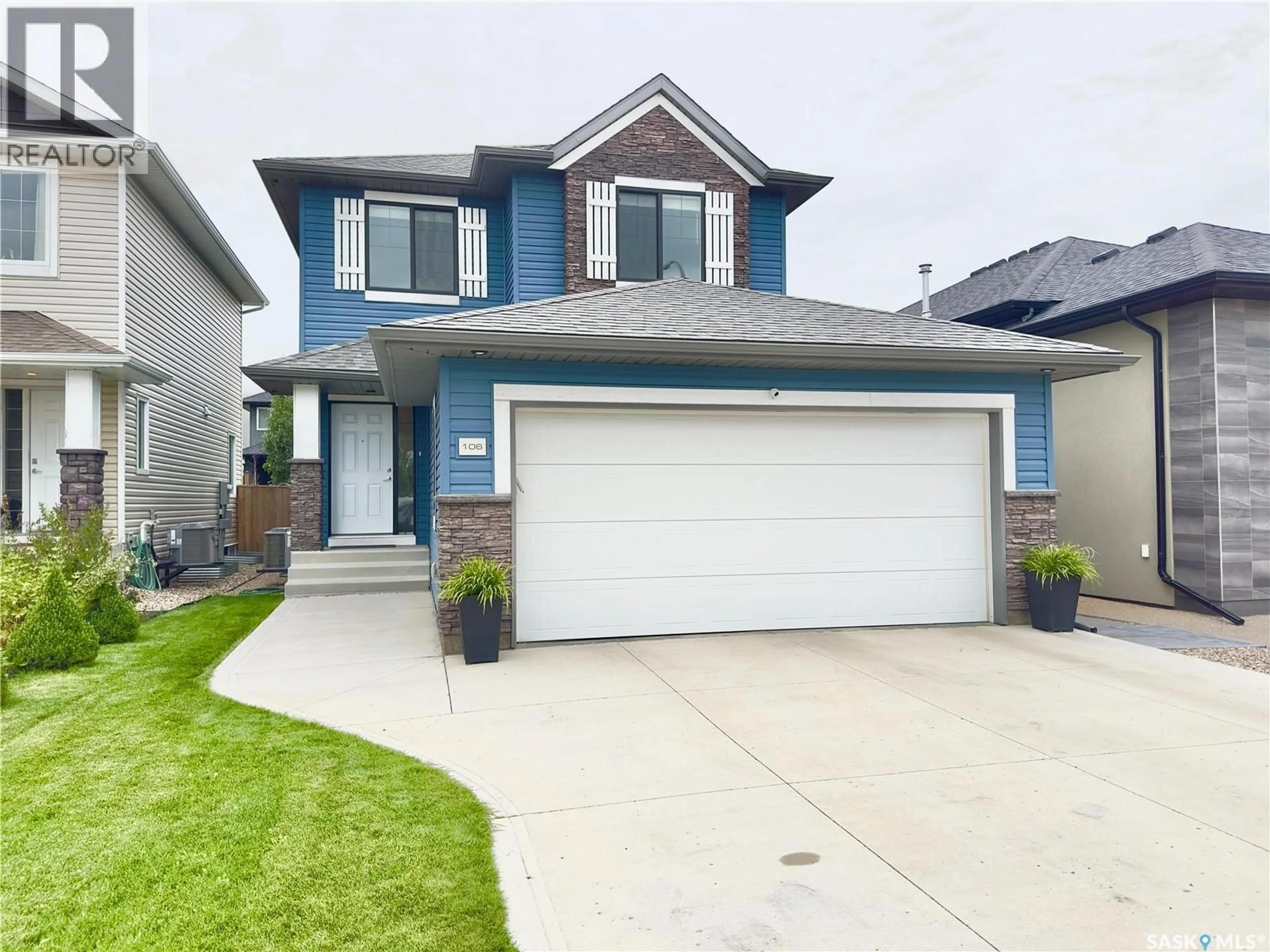 Home with vinyl exterior material, street for 106 BURGESS CRESCENT, Saskatoon Saskatchewan S7V0S1
