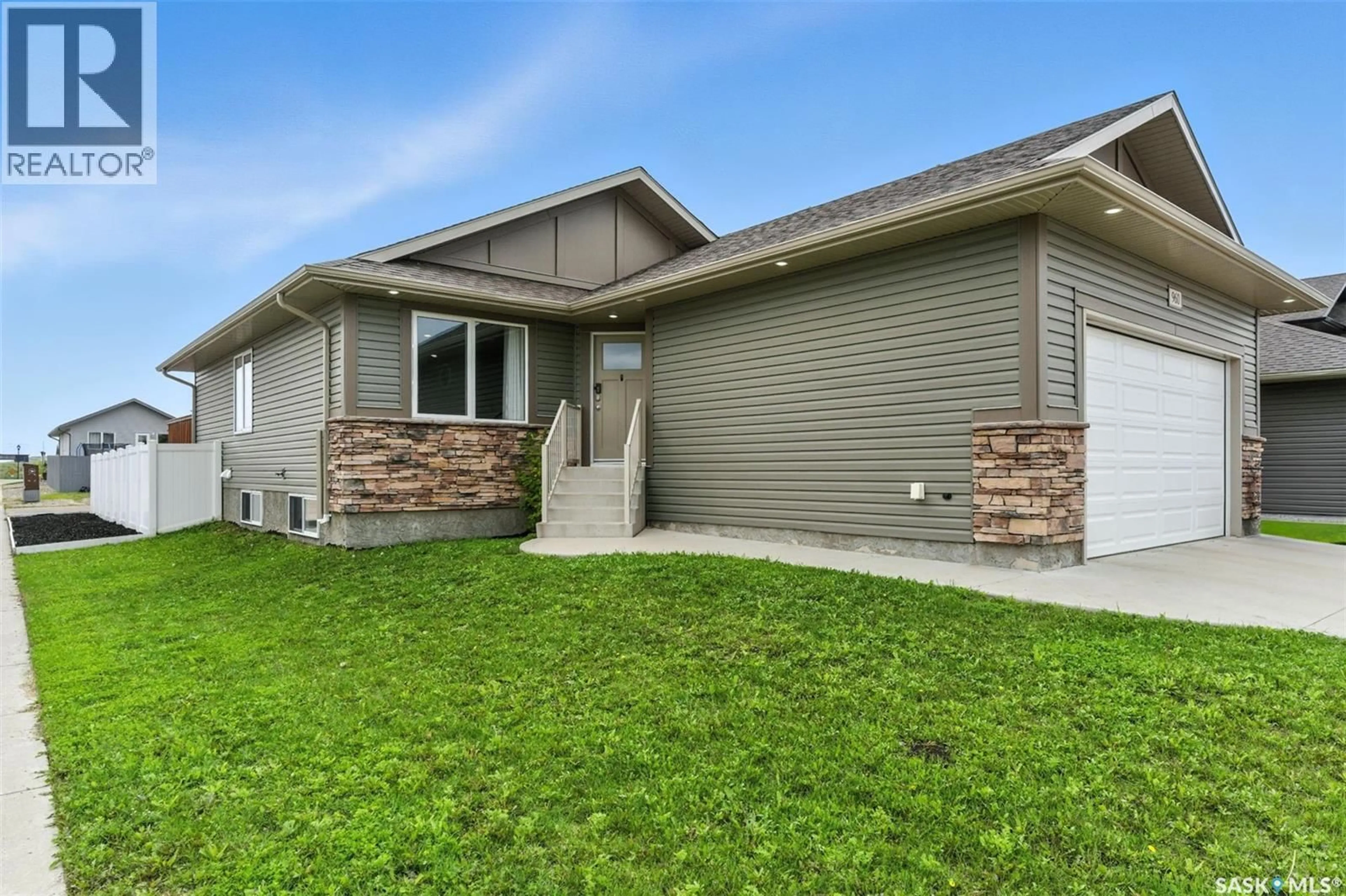 Home with vinyl exterior material, street for 960 REIMER ROAD, Martensville Saskatchewan S0K0A2