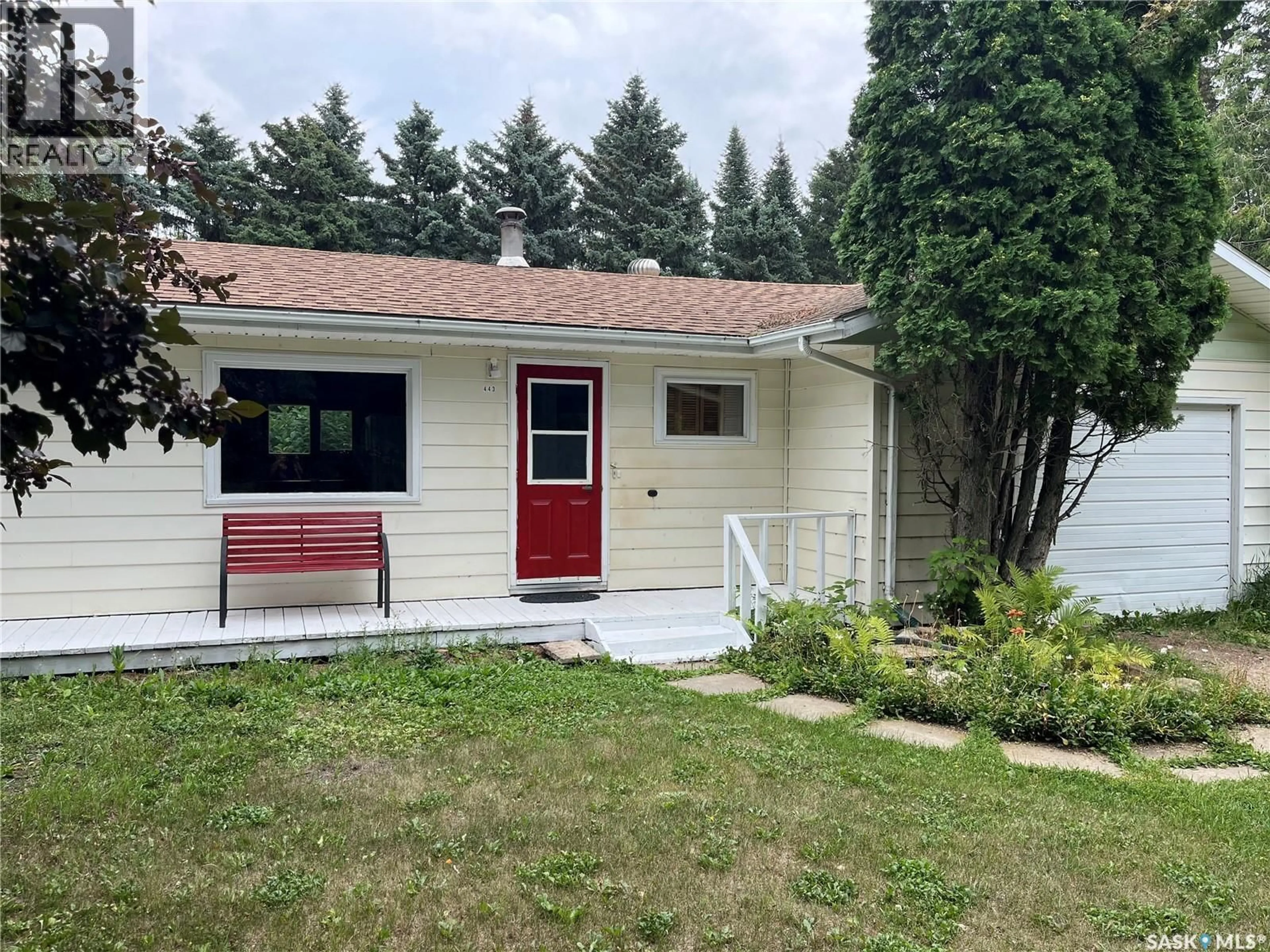 Home with vinyl exterior material, street for 443 1ST STREET, Annaheim Saskatchewan S0K0G0