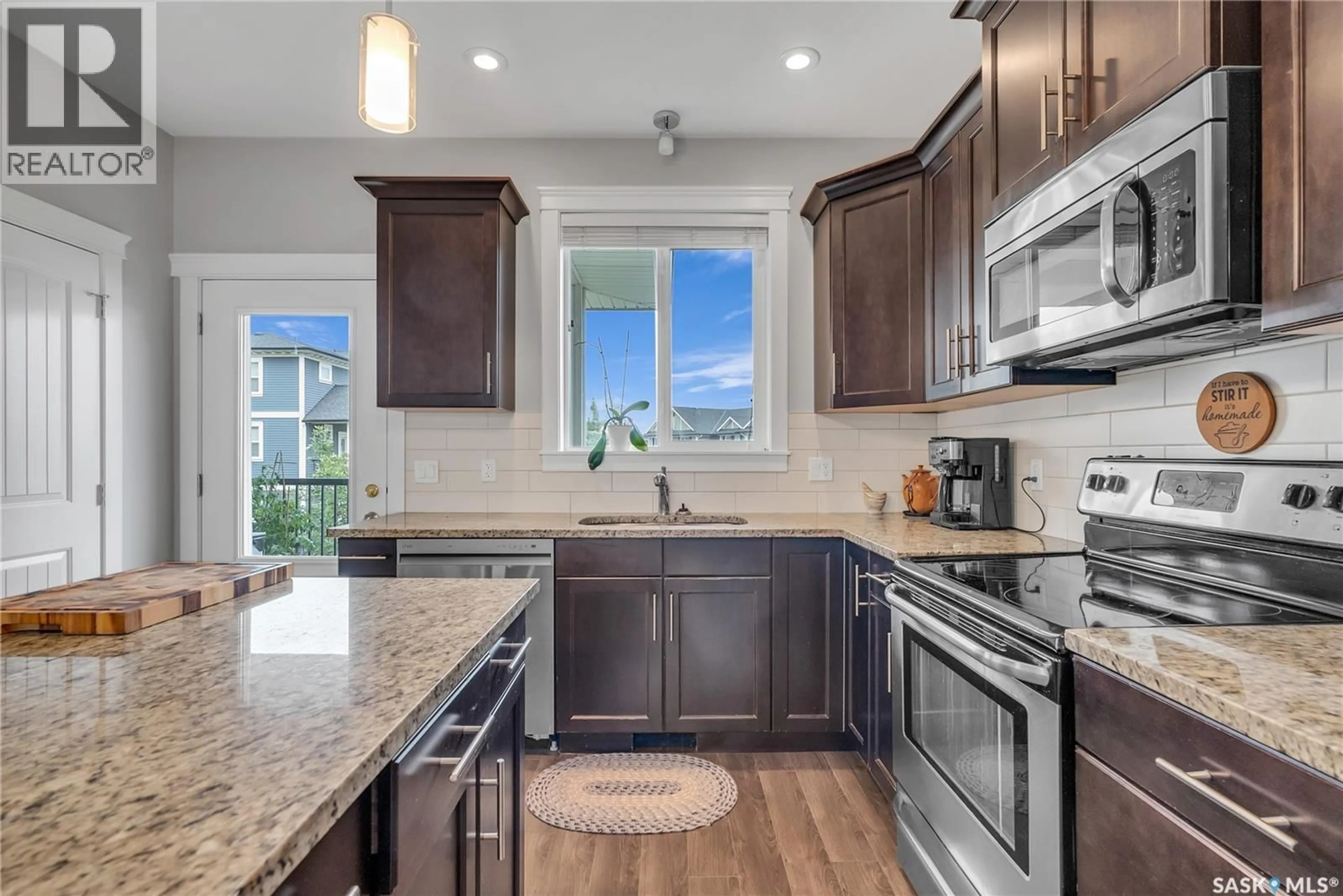 Open concept kitchen, ceramic/tile floor for 425 - 35 LANGER PLACE, Warman Saskatchewan S0K4S1