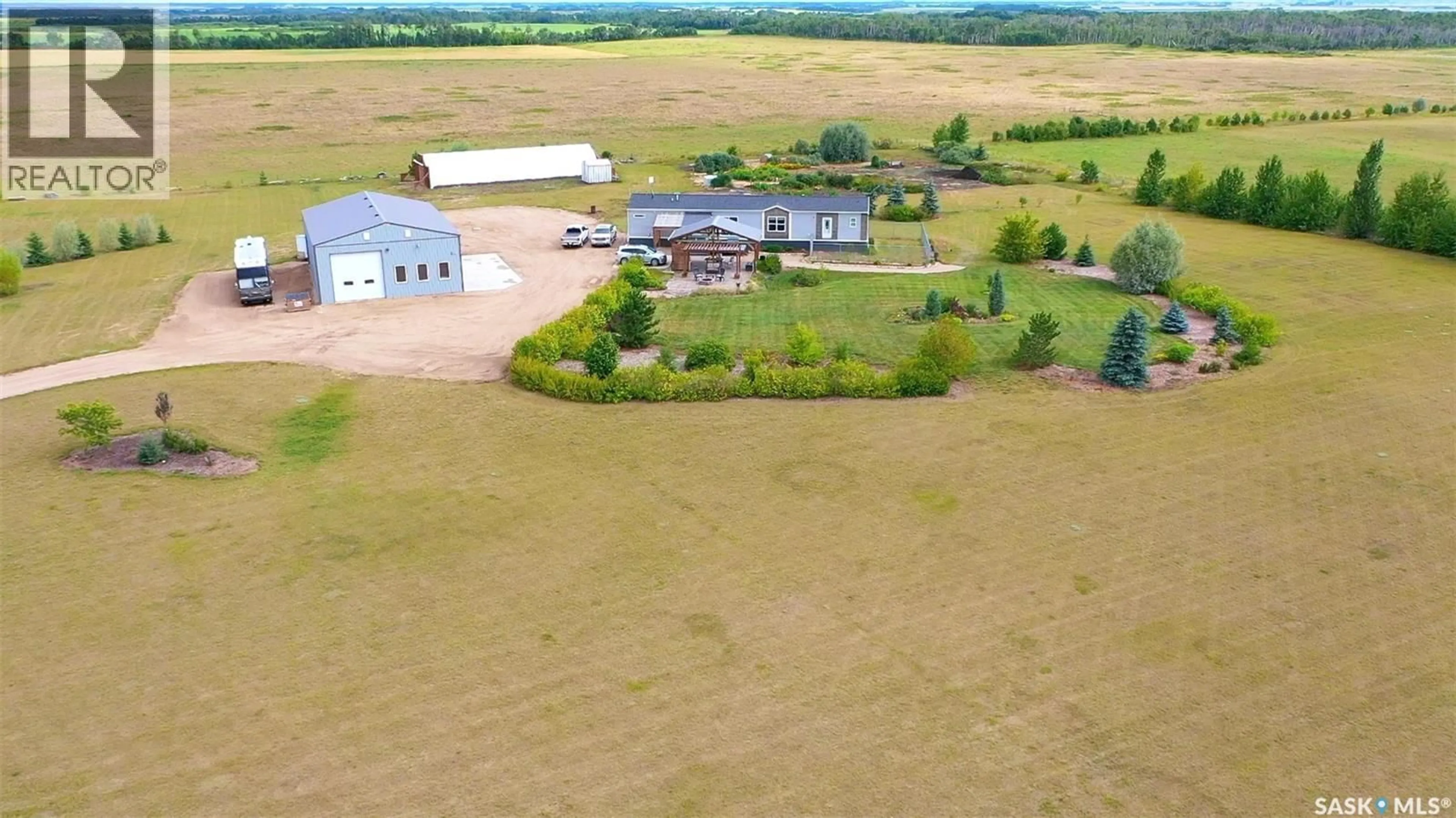 A pic from outside/outdoor area/front of a property/back of a property/a pic from drone, building for ACREAGE, Orkney Rm No. 244 Saskatchewan S0A0T0