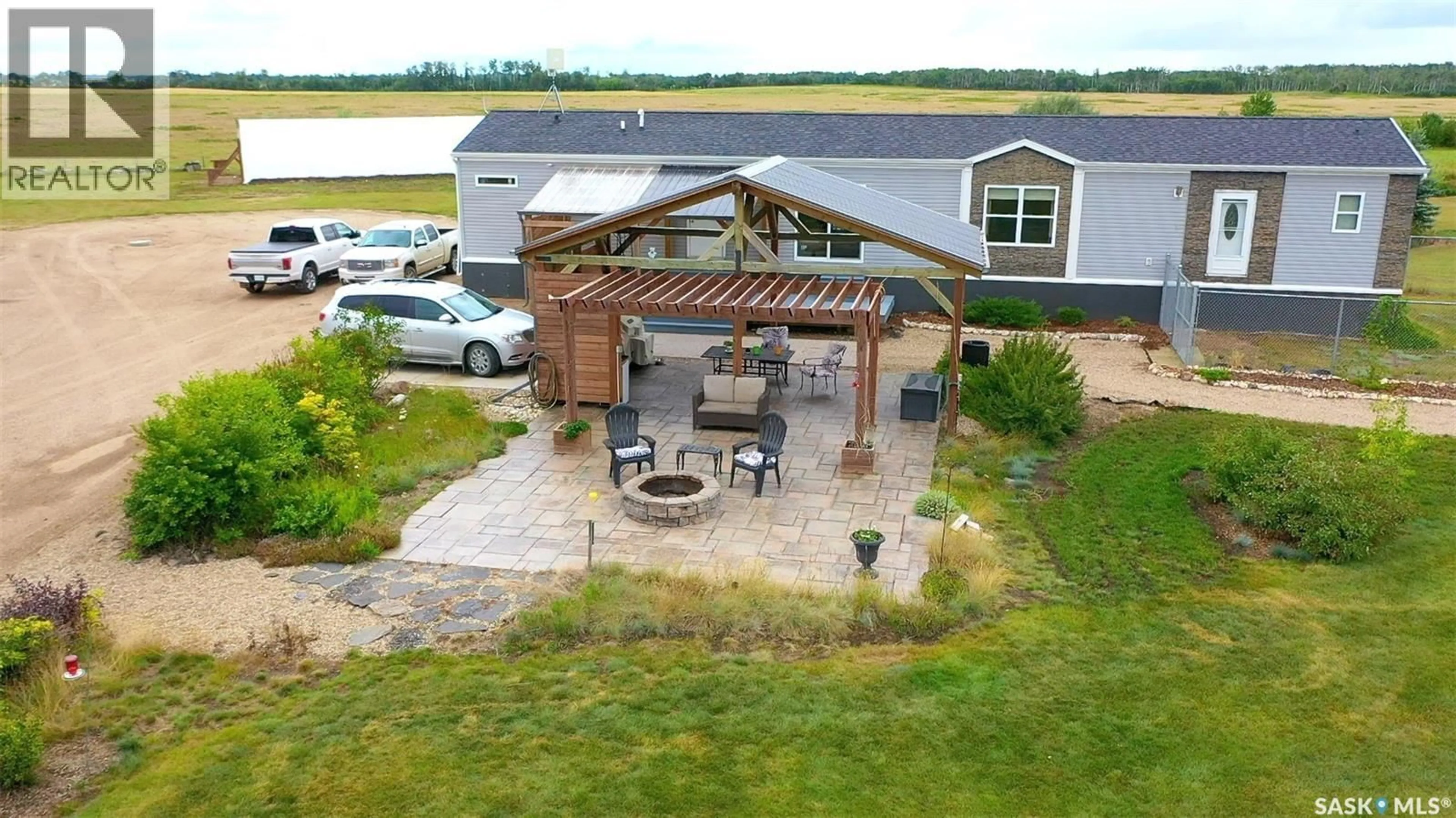 A pic from outside/outdoor area/front of a property/back of a property/a pic from drone, water/lake/river/ocean view for ACREAGE, Orkney Rm No. 244 Saskatchewan S0A0T0