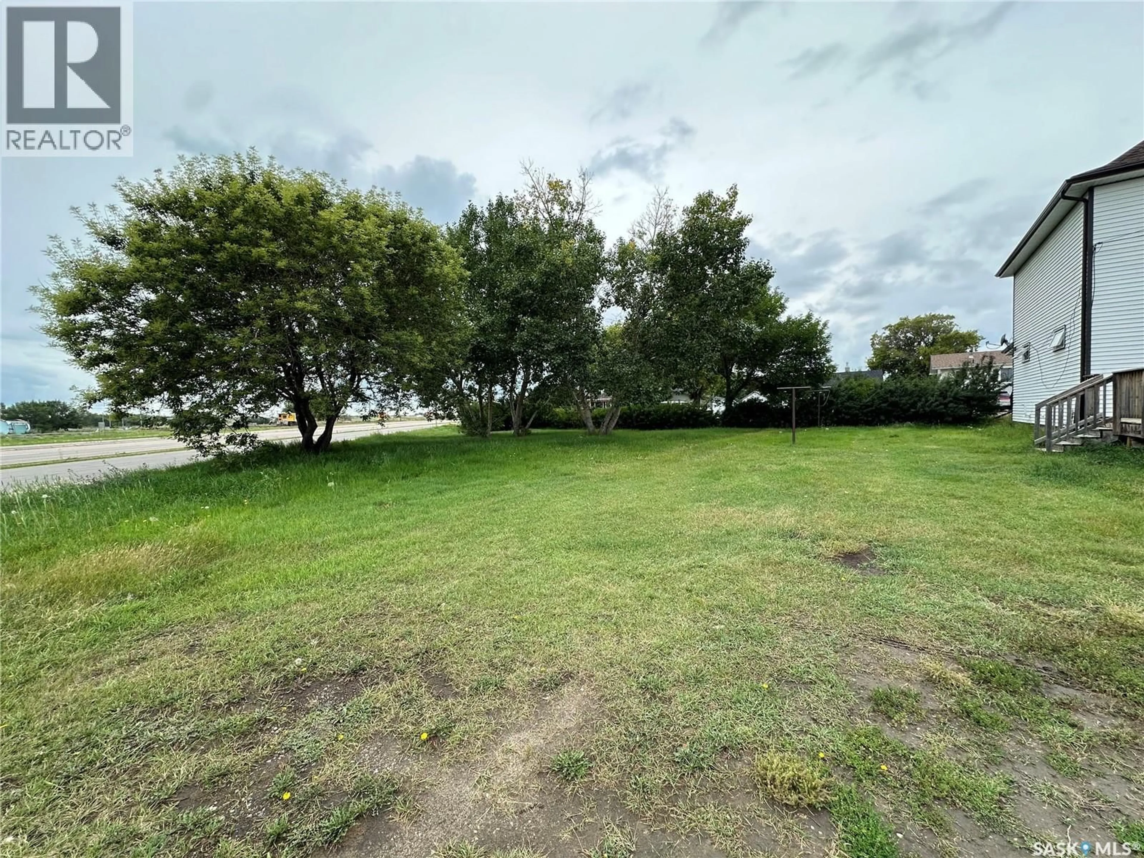 A pic from outside/outdoor area/front of a property/back of a property/a pic from drone, water/lake/river/ocean view for 101 2ND STREET, Delisle Saskatchewan S0L0P0