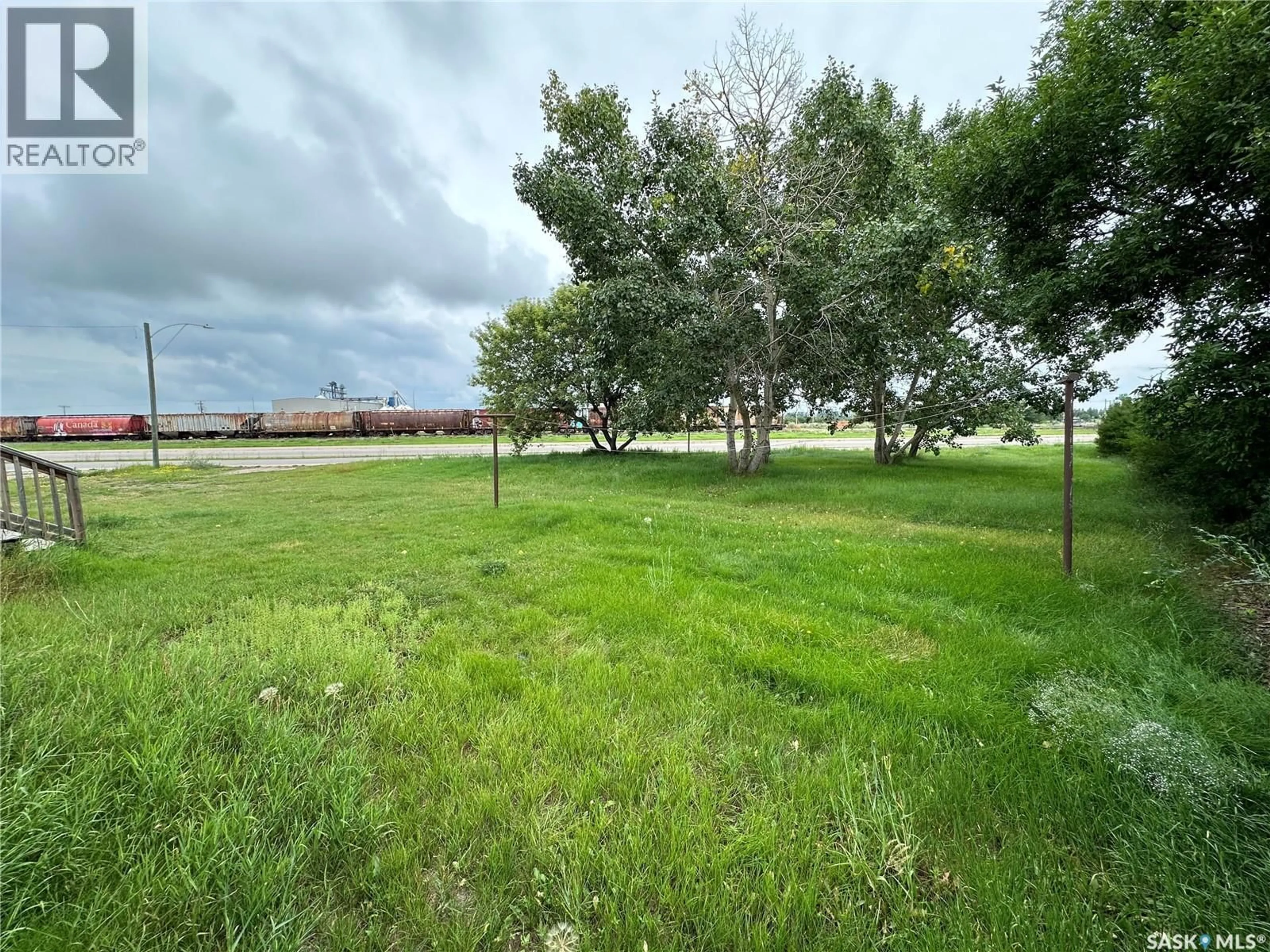 A pic from outside/outdoor area/front of a property/back of a property/a pic from drone, forest/trees view for 101 2ND STREET, Delisle Saskatchewan S0L0P0