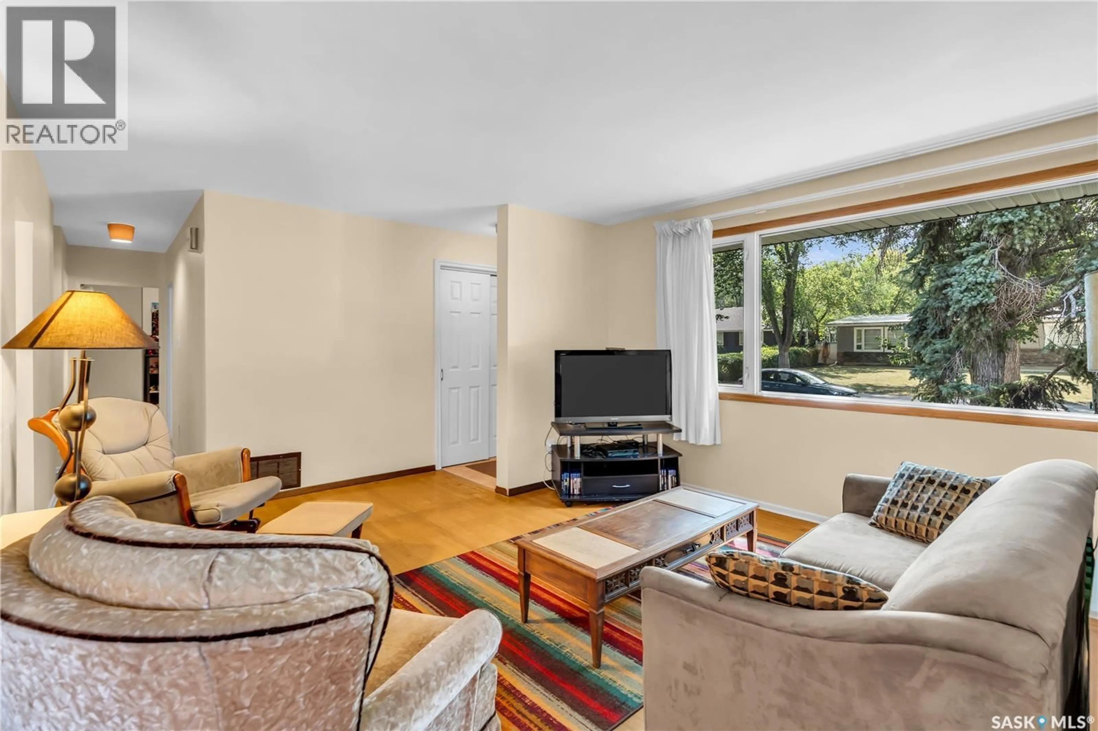 Living room with furniture, unknown for 33 BOBOLINK BAY, Regina Saskatchewan S4S4K2