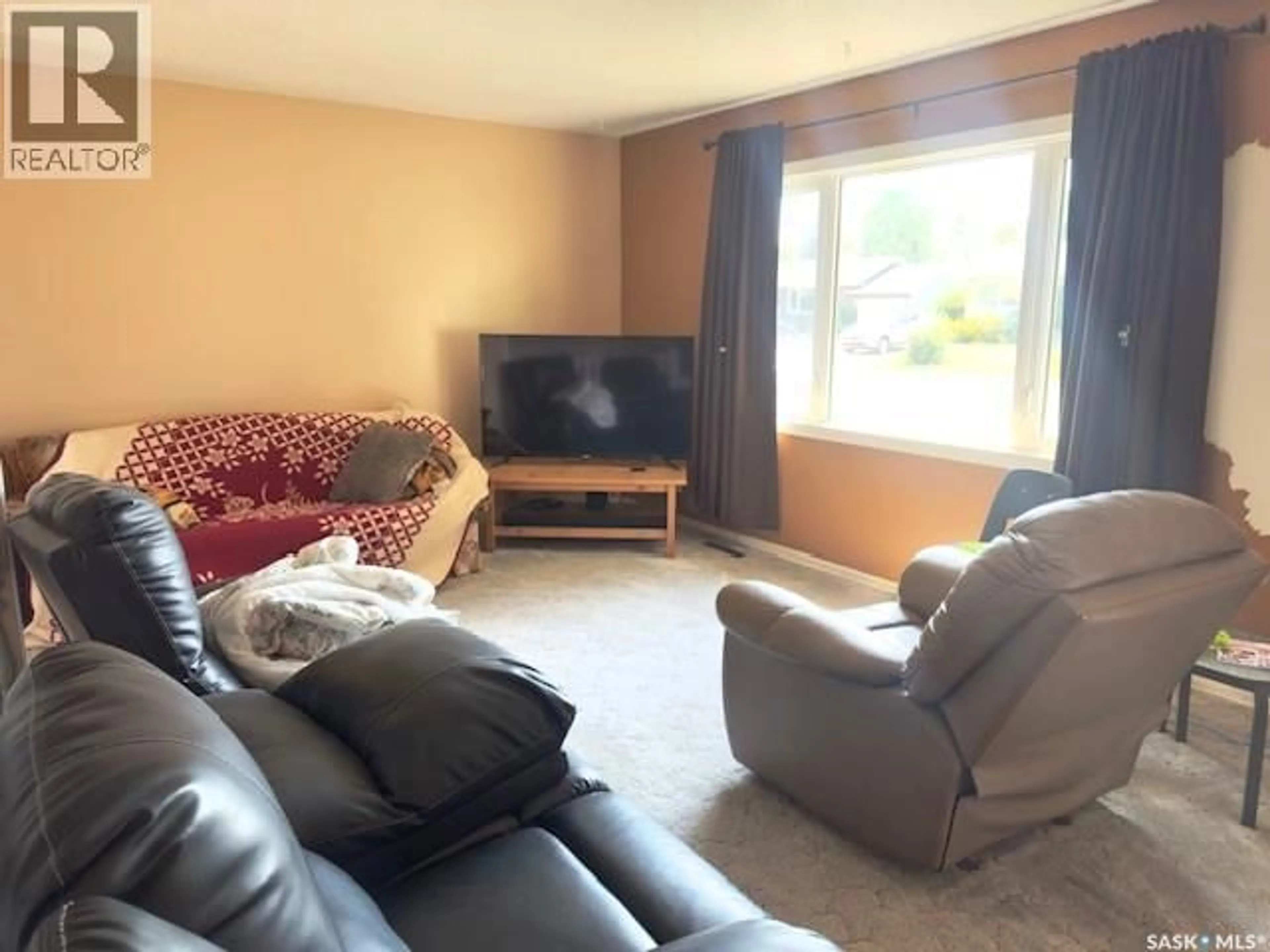 Living room with furniture, unknown for 8921 19TH AVENUE, North Battleford Saskatchewan S9A2V8
