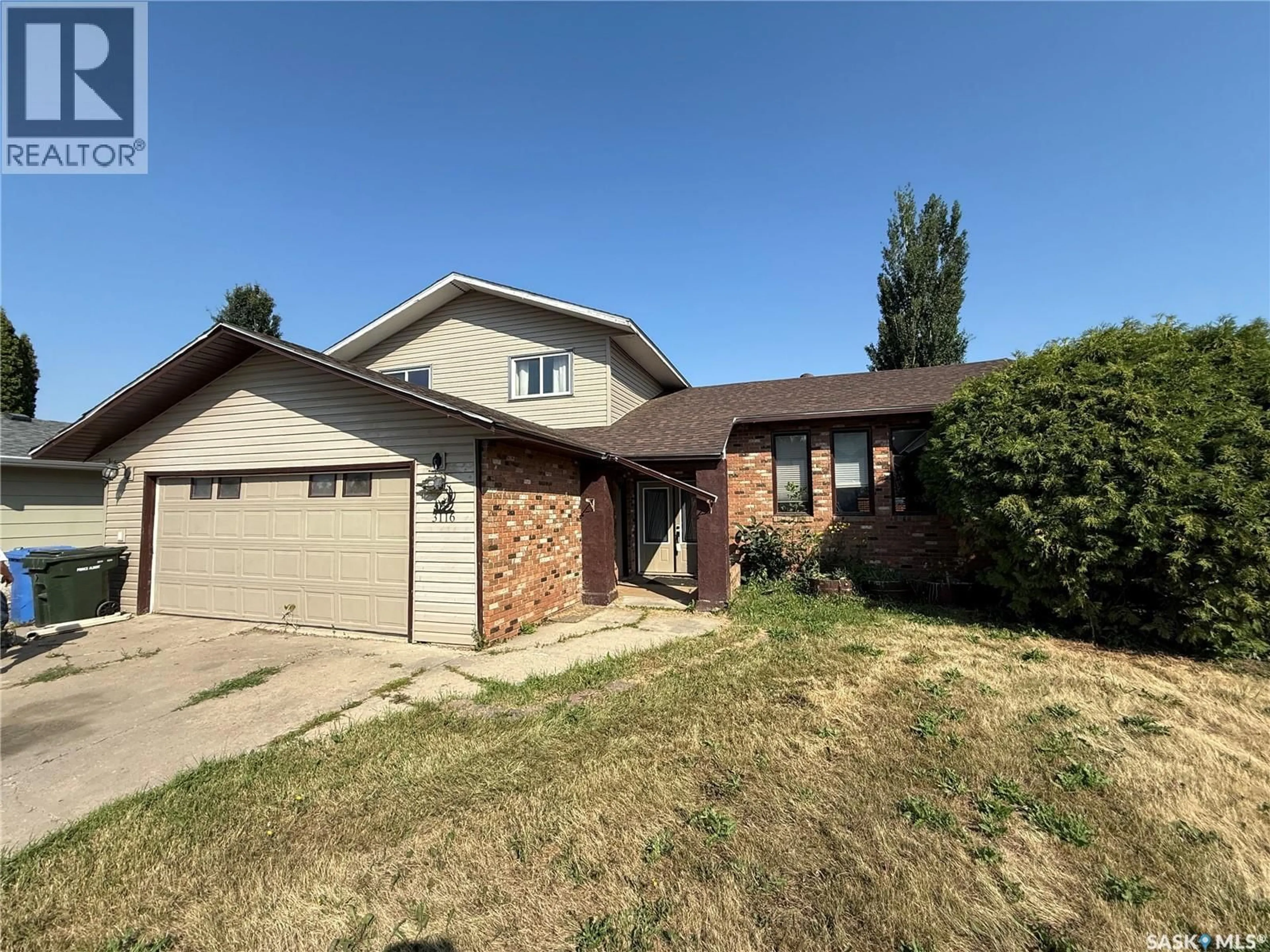 Home with brick exterior material, street for 3116 GREY OWL CRESCENT, Prince Albert Saskatchewan S6V6X4